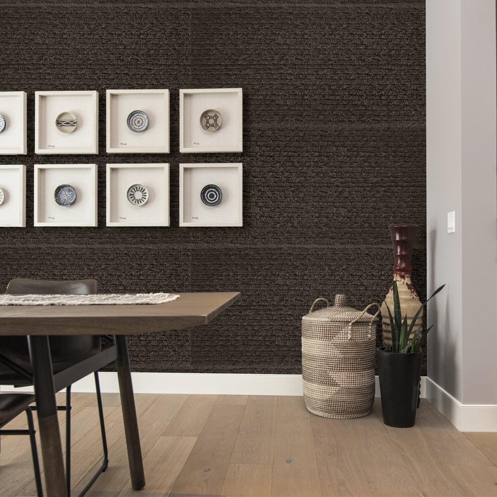 Dining room with decorative faux stone wall panels in charcoal brown for modern interior wall design