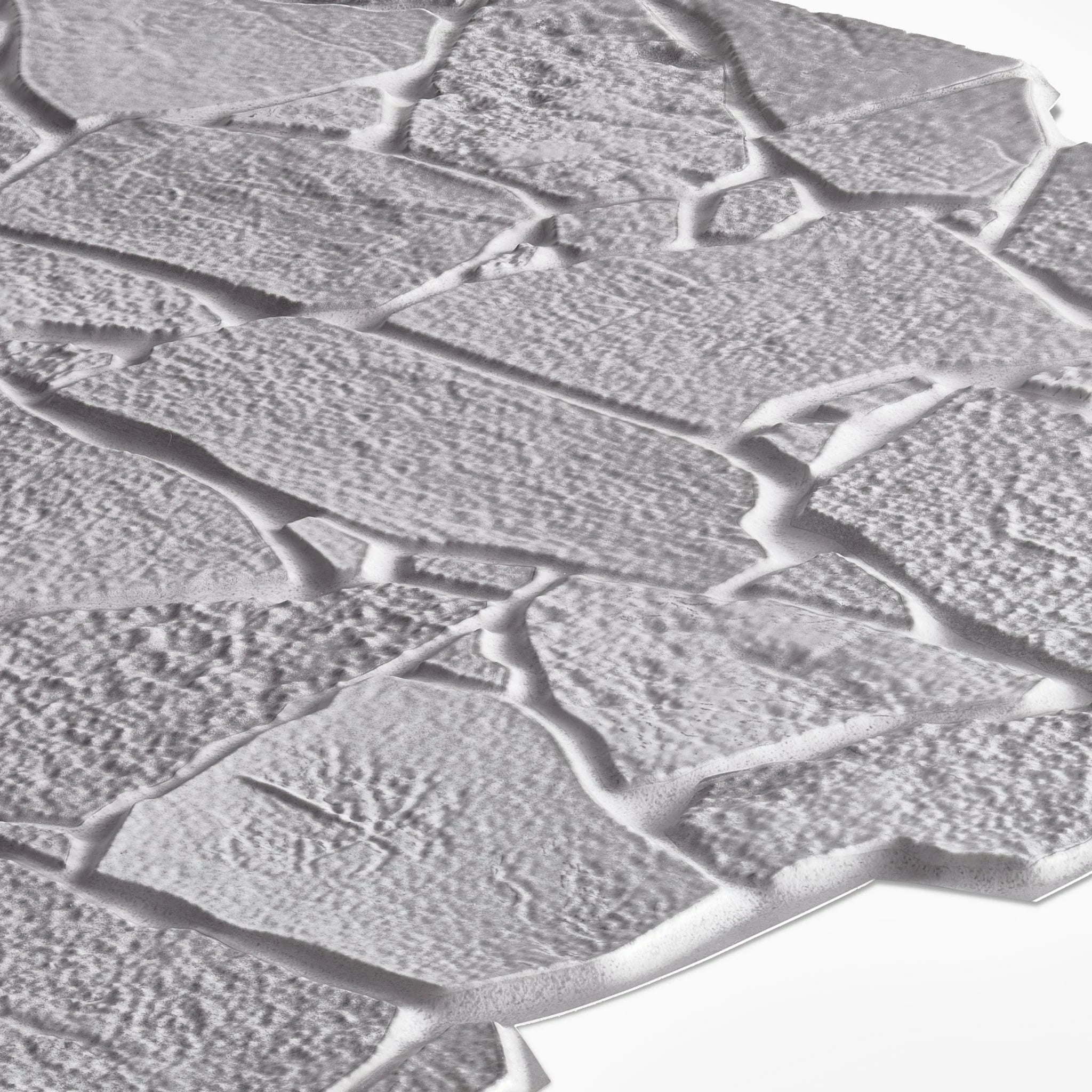 angled view of grey wild stone pattern 3d wall panel
