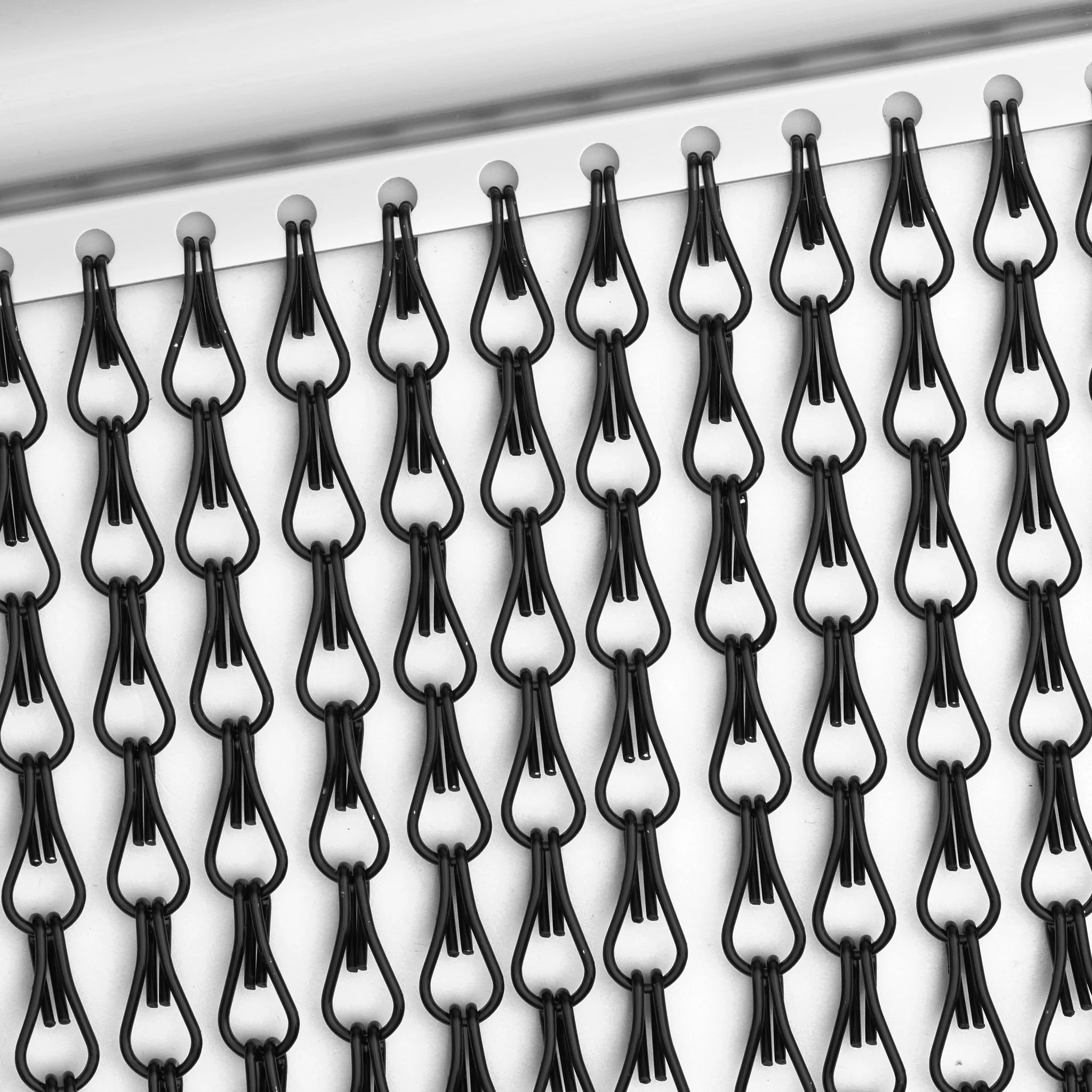 Metal chain door curtain links attached close-up view
