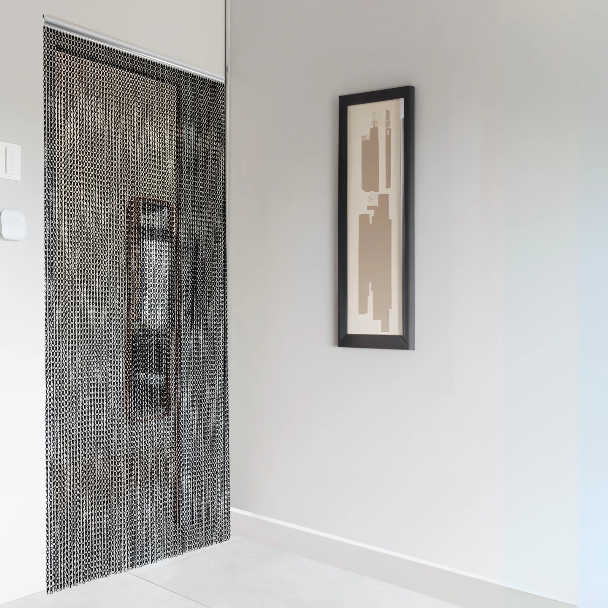 Full view of a hanging black chain fly screens for doors