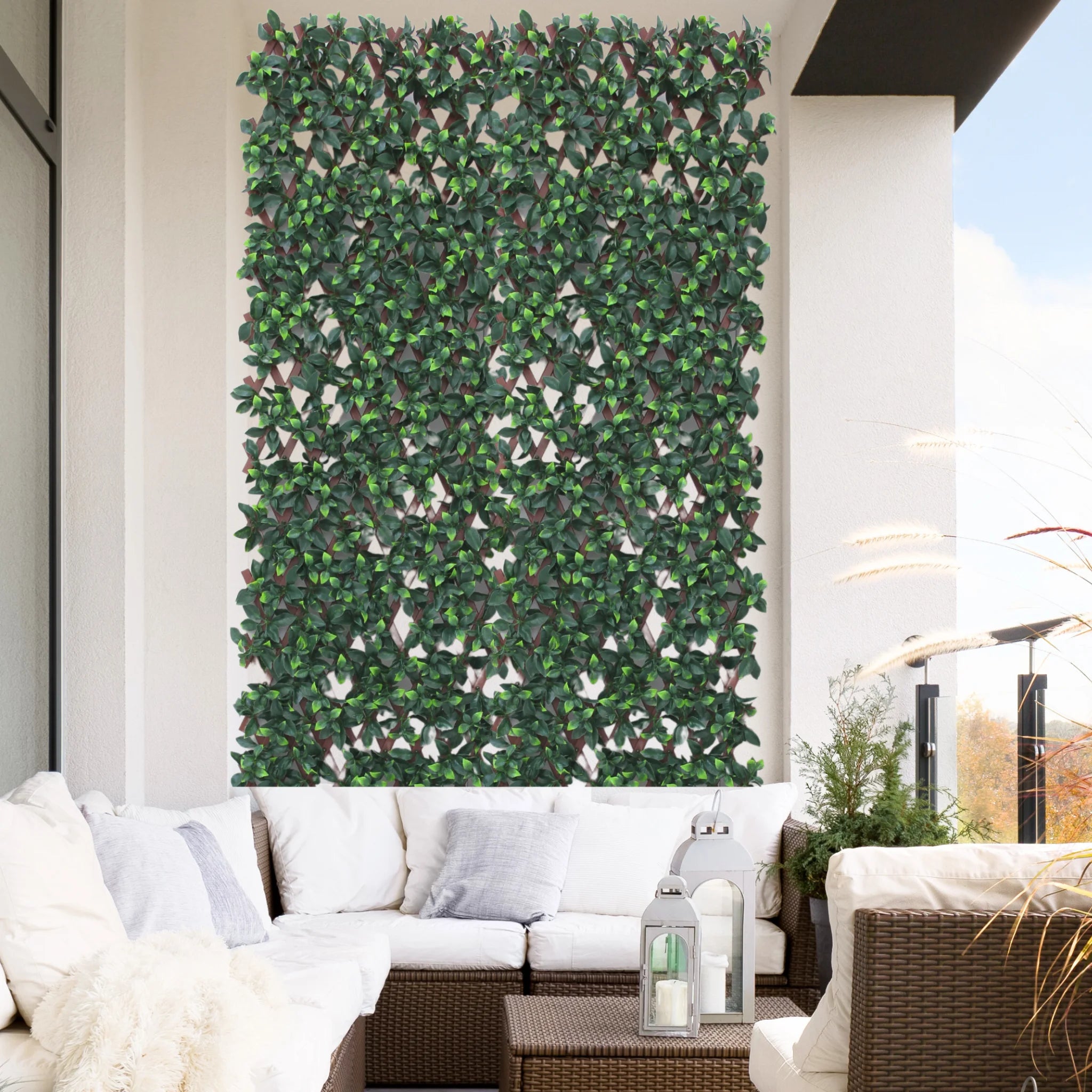 lush green expanding trellis with artificial leaves on wall
