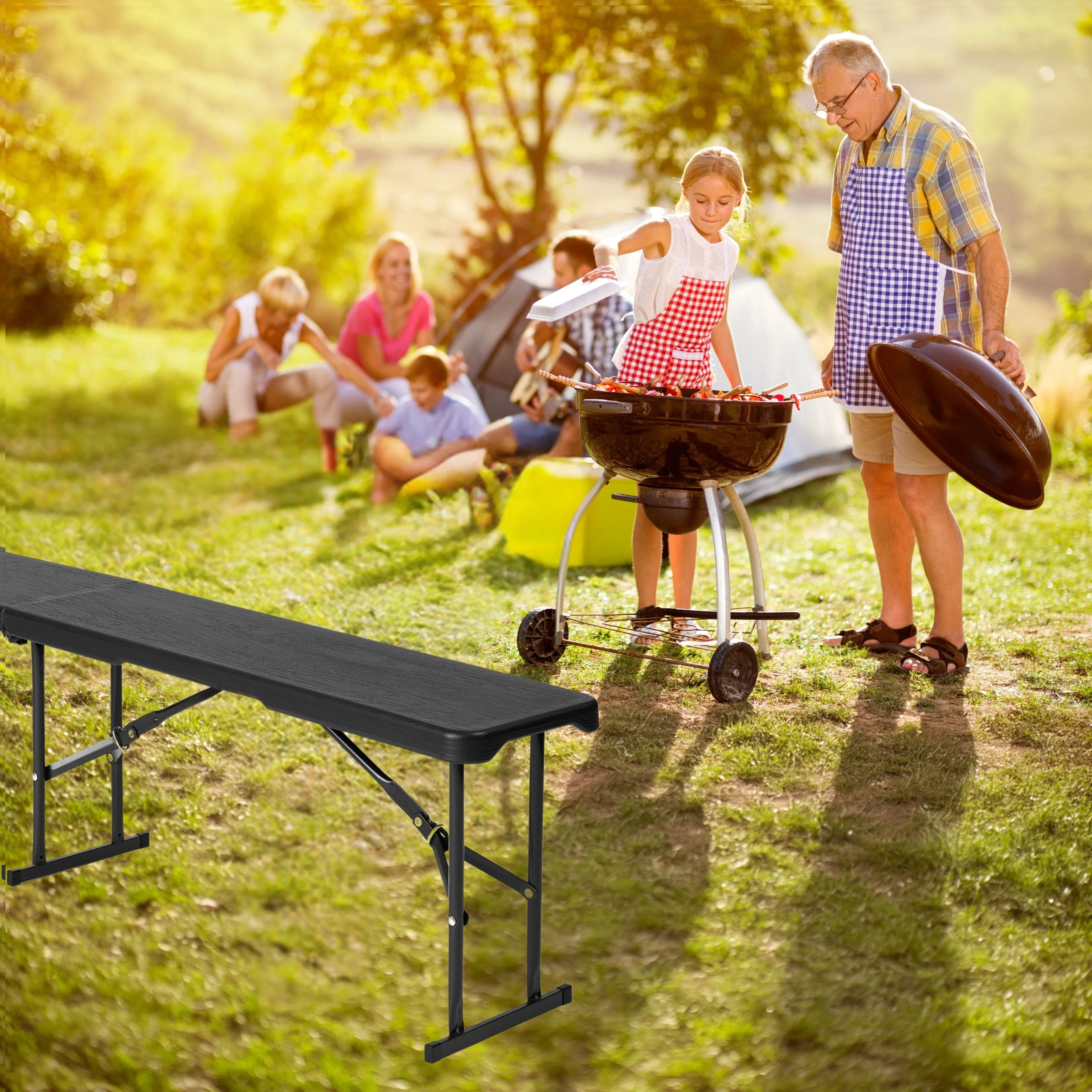 black folding bench in use at outdoor barbecue