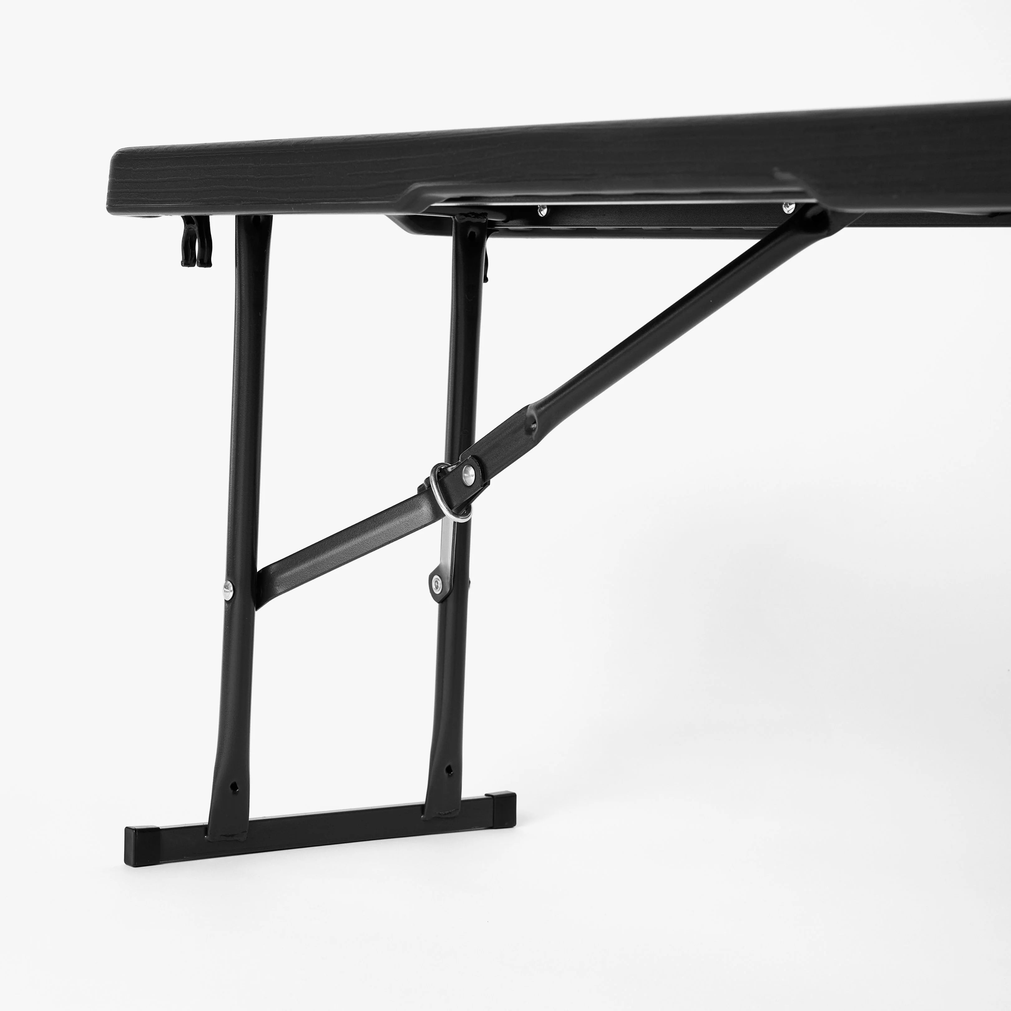 close up of black folding bench