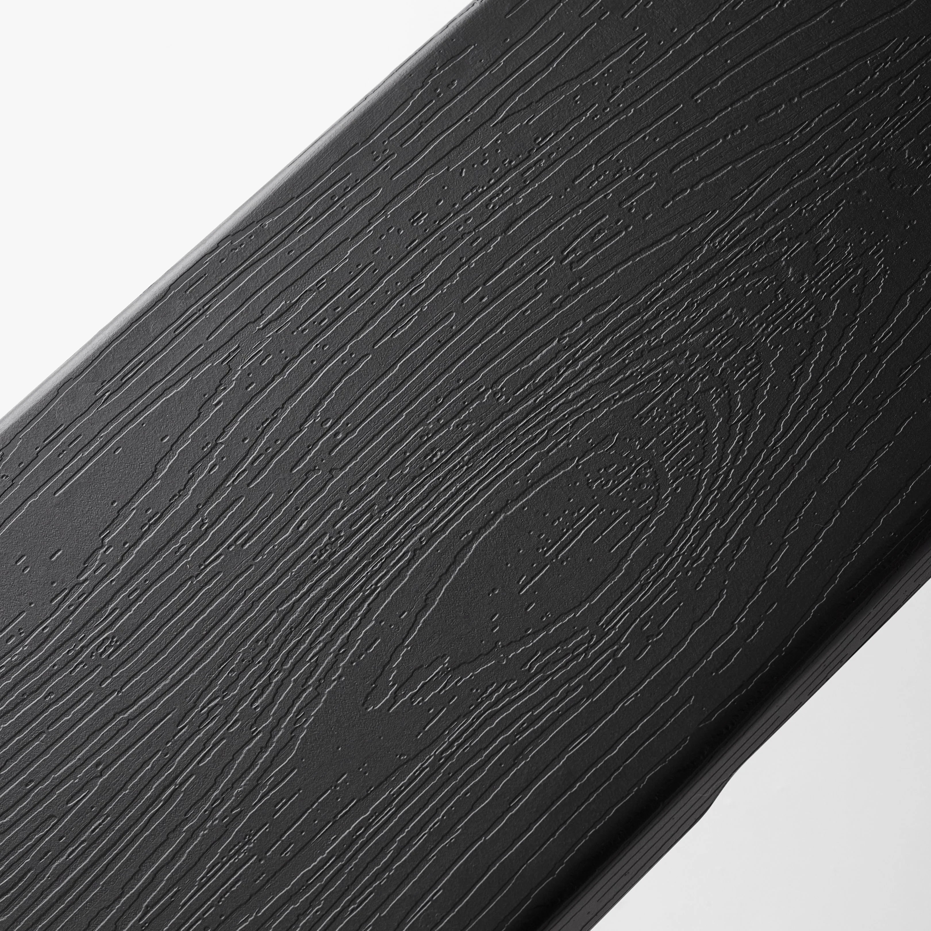 close up of black textured bench surface