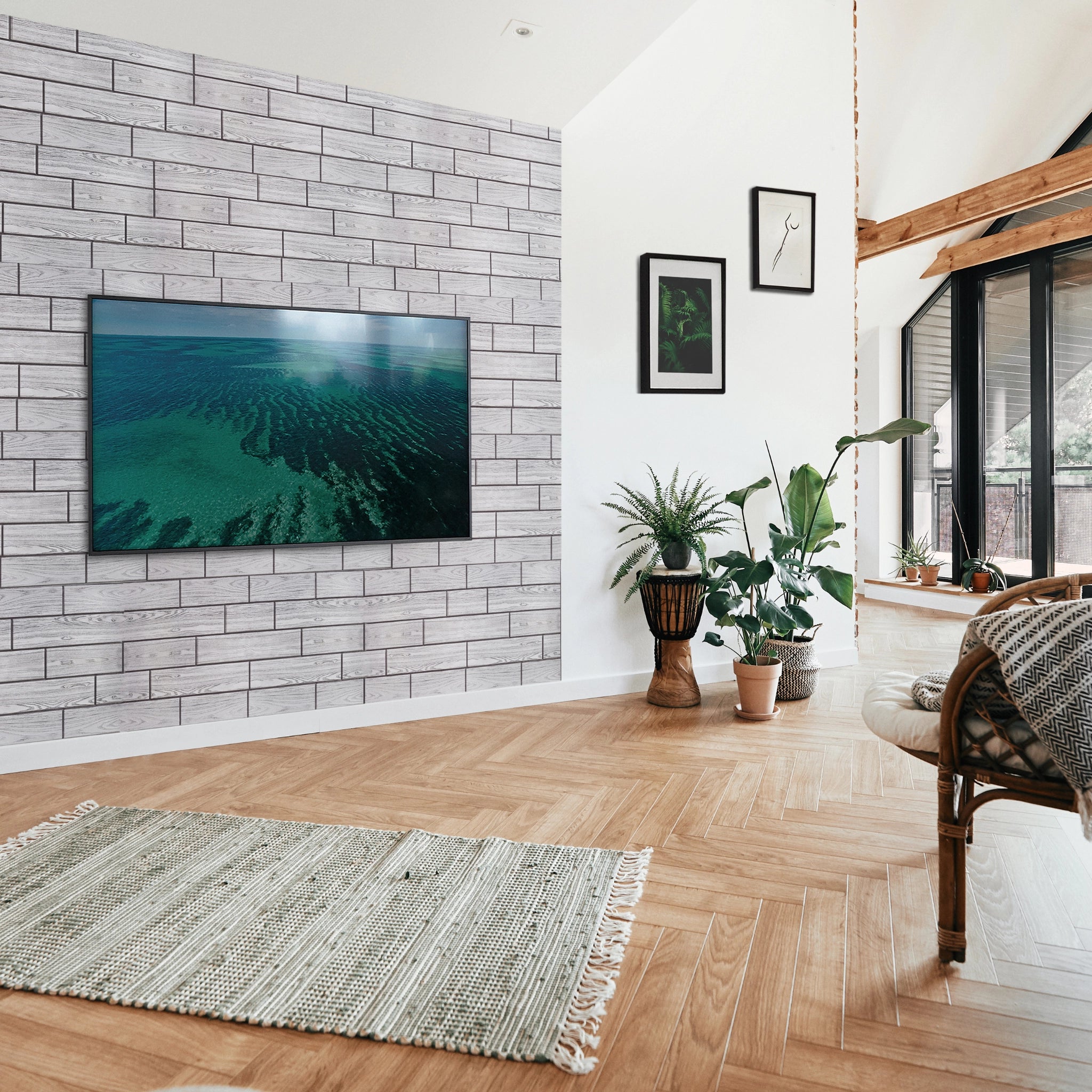 Modern living room with grey wall panel featuring geometric patterns