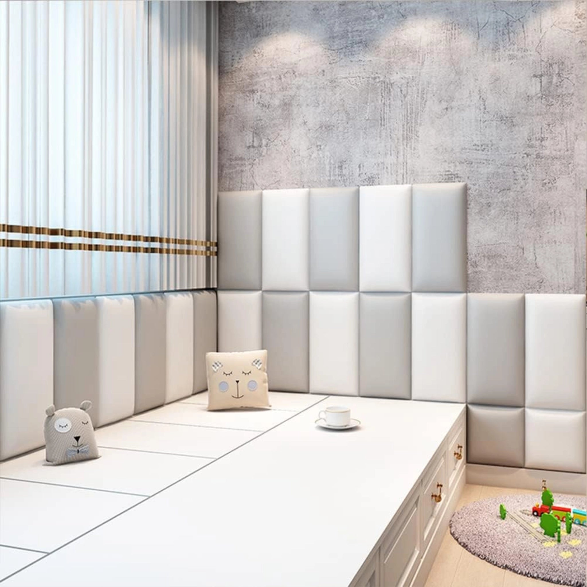 Living room with graphite upholstered wall panels and modern furniture