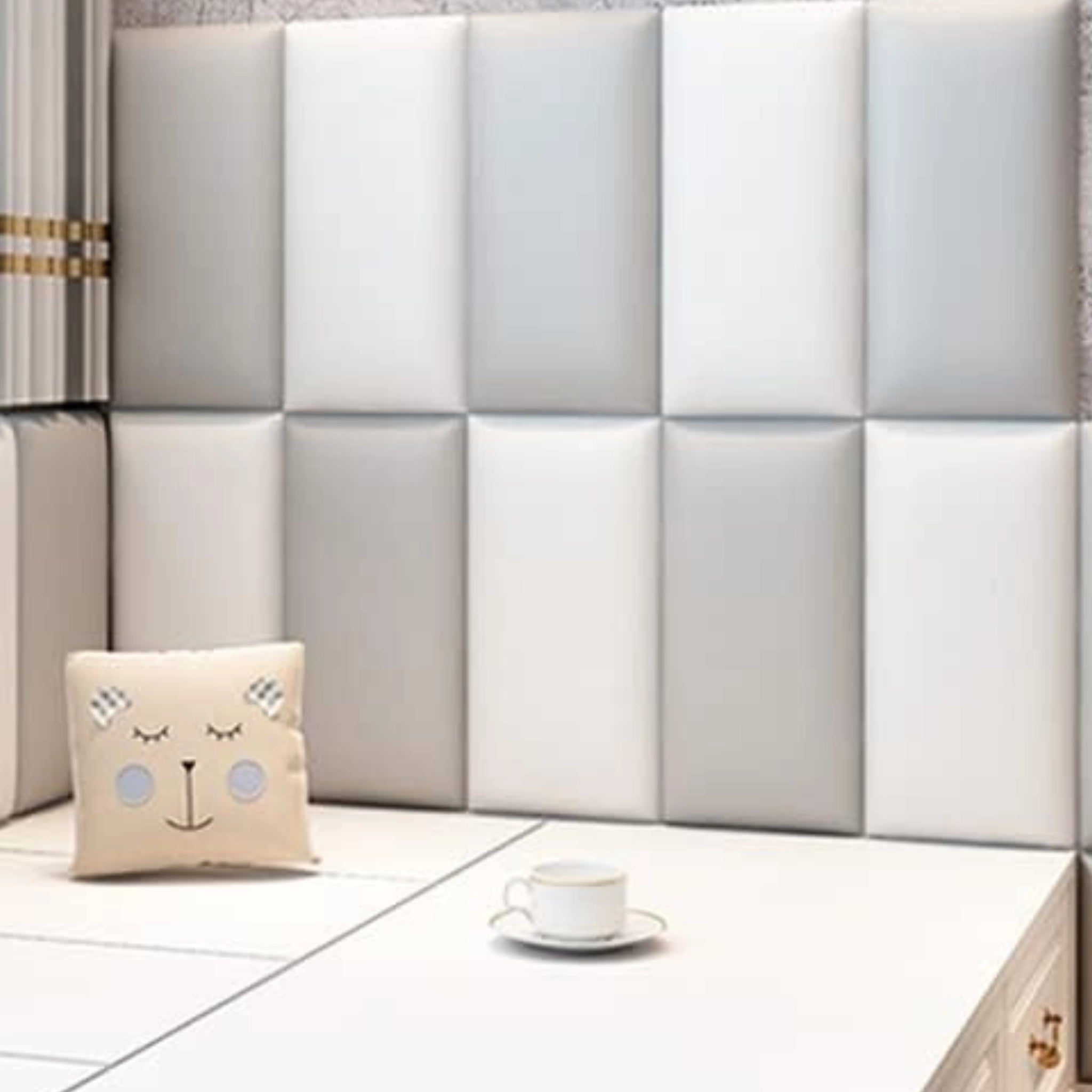 Living room with graphite upholstered wall panels and modern furniture