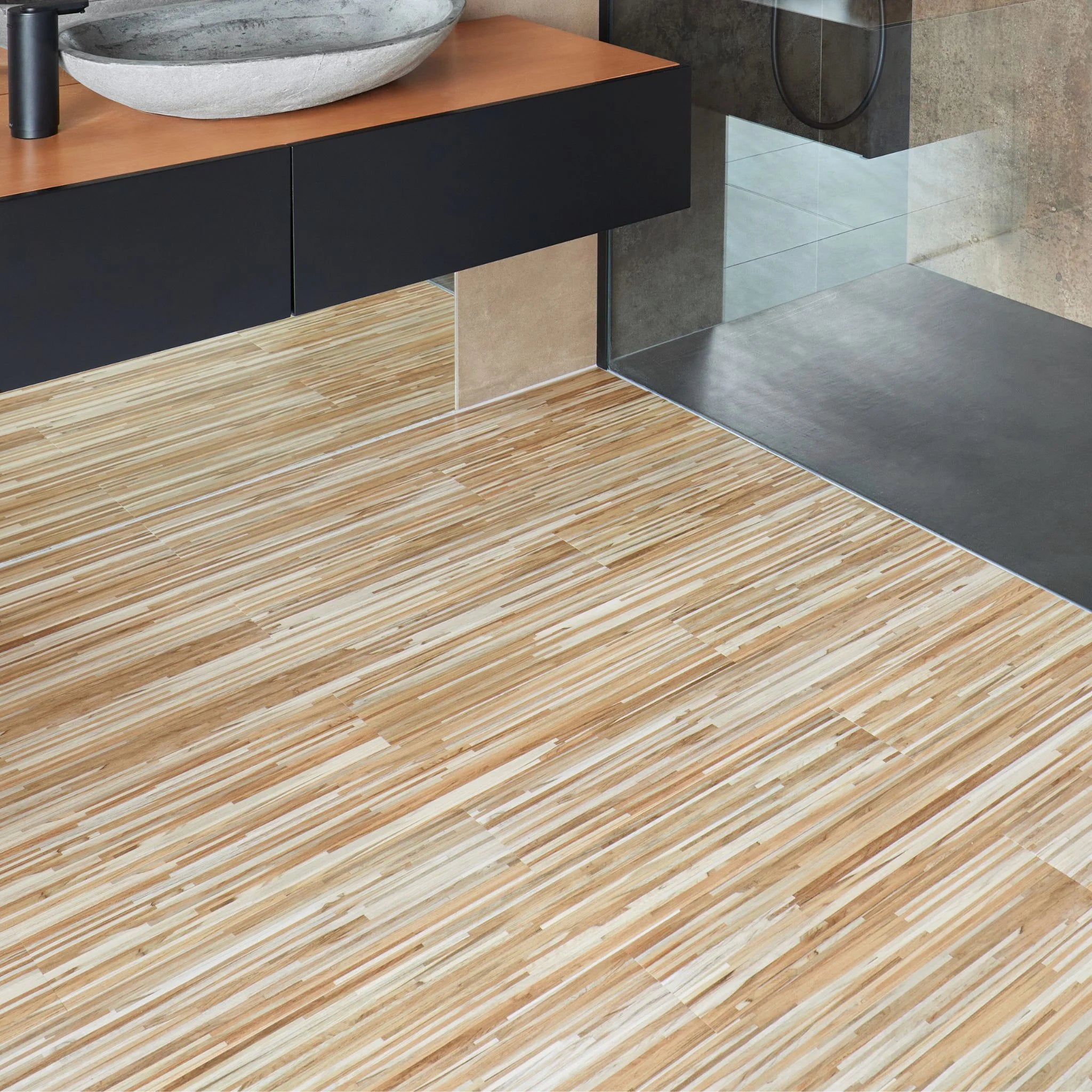 Striped beige vinyl wooden flooring in a modern bathroom setting