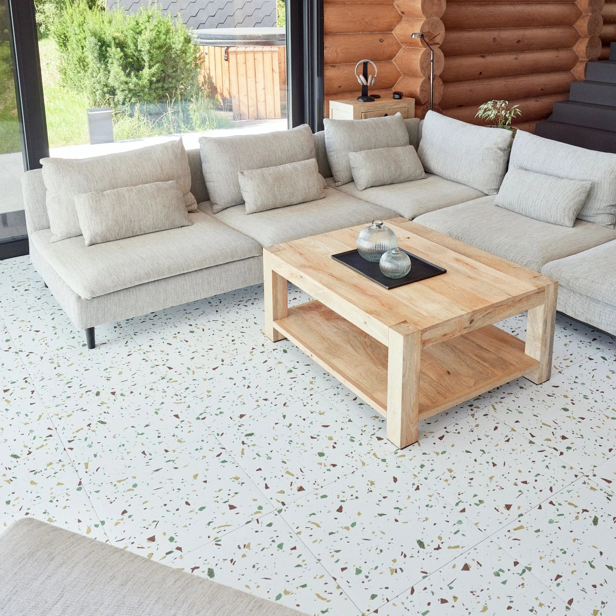 cozy living room with large square terrazzo tile flooring