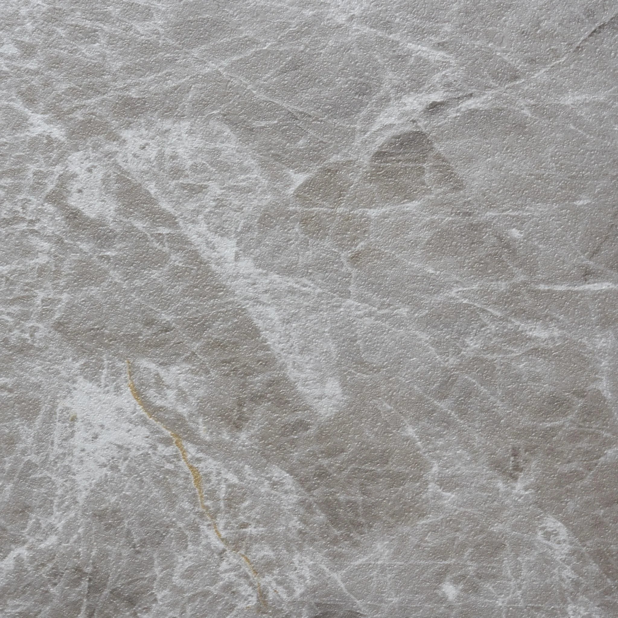 close-up of a concrete-effect vinyl plank in light grey