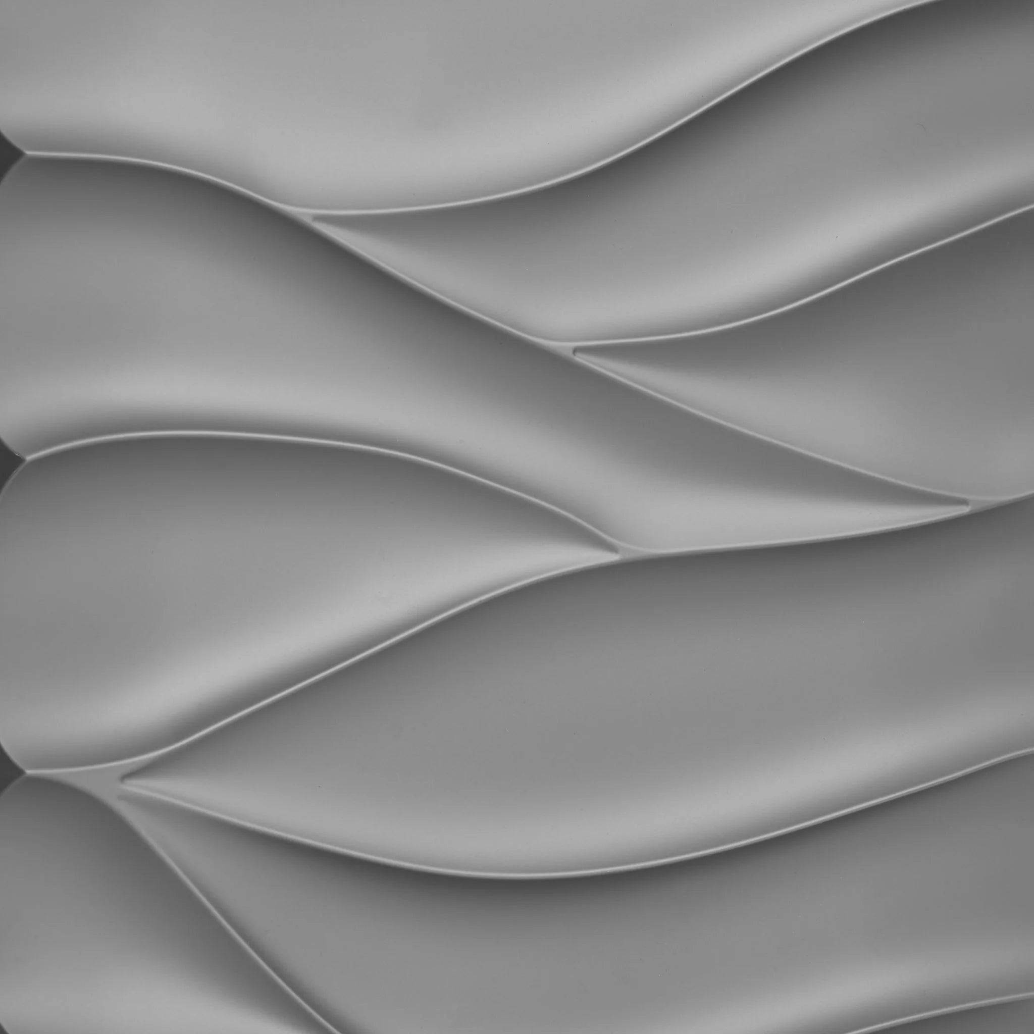 Close-up of silver PVC wall panel with wavy designs
