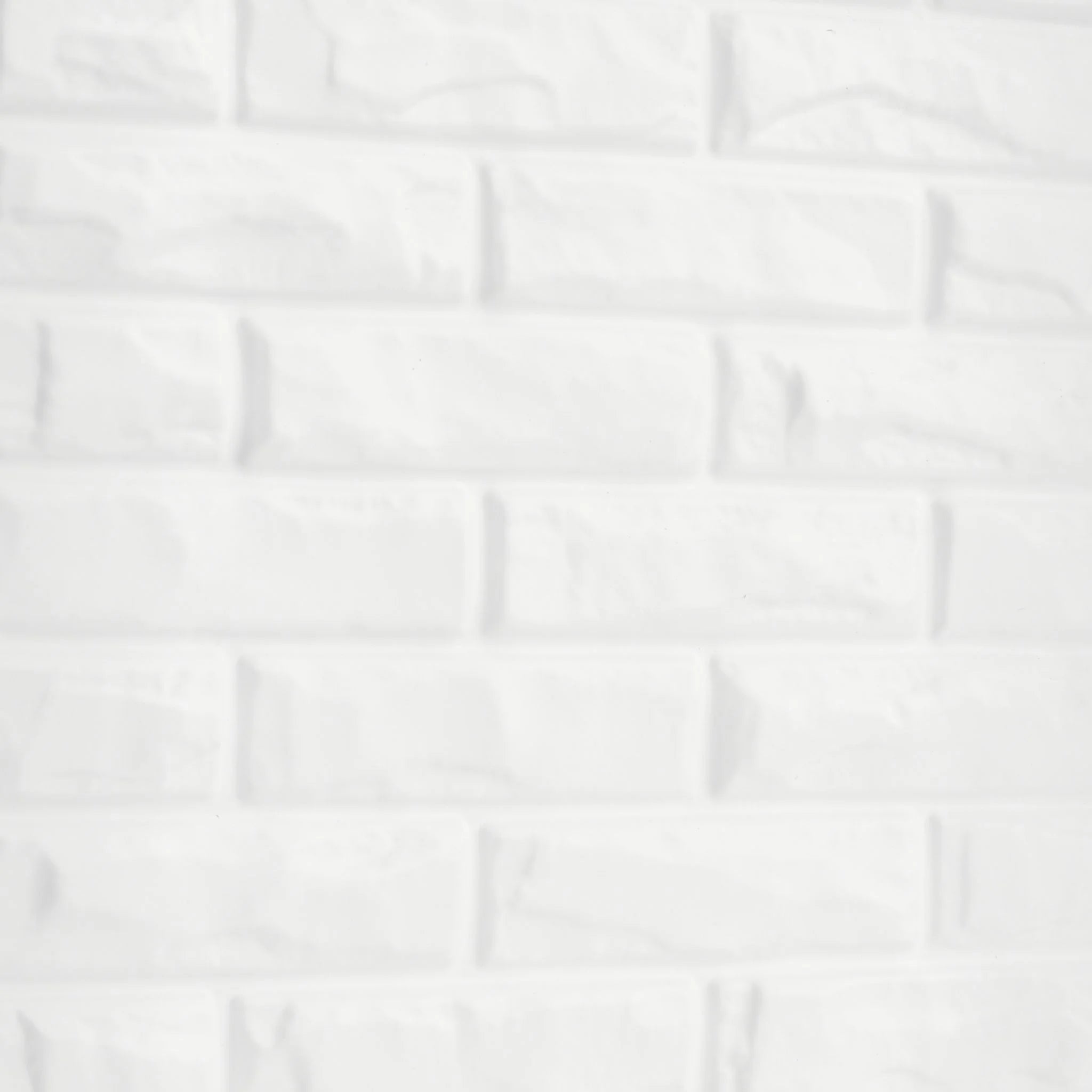 Close-up of white PVC wall panel with brick designs