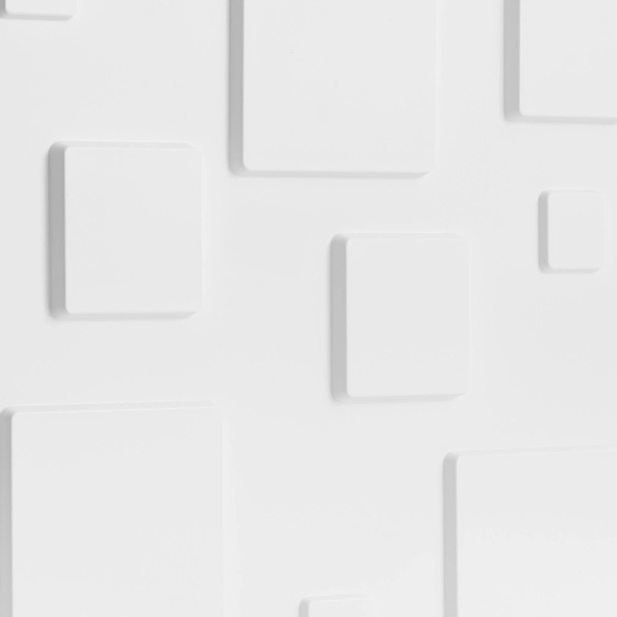 Close-up of white PVC wall panel with geometric designs