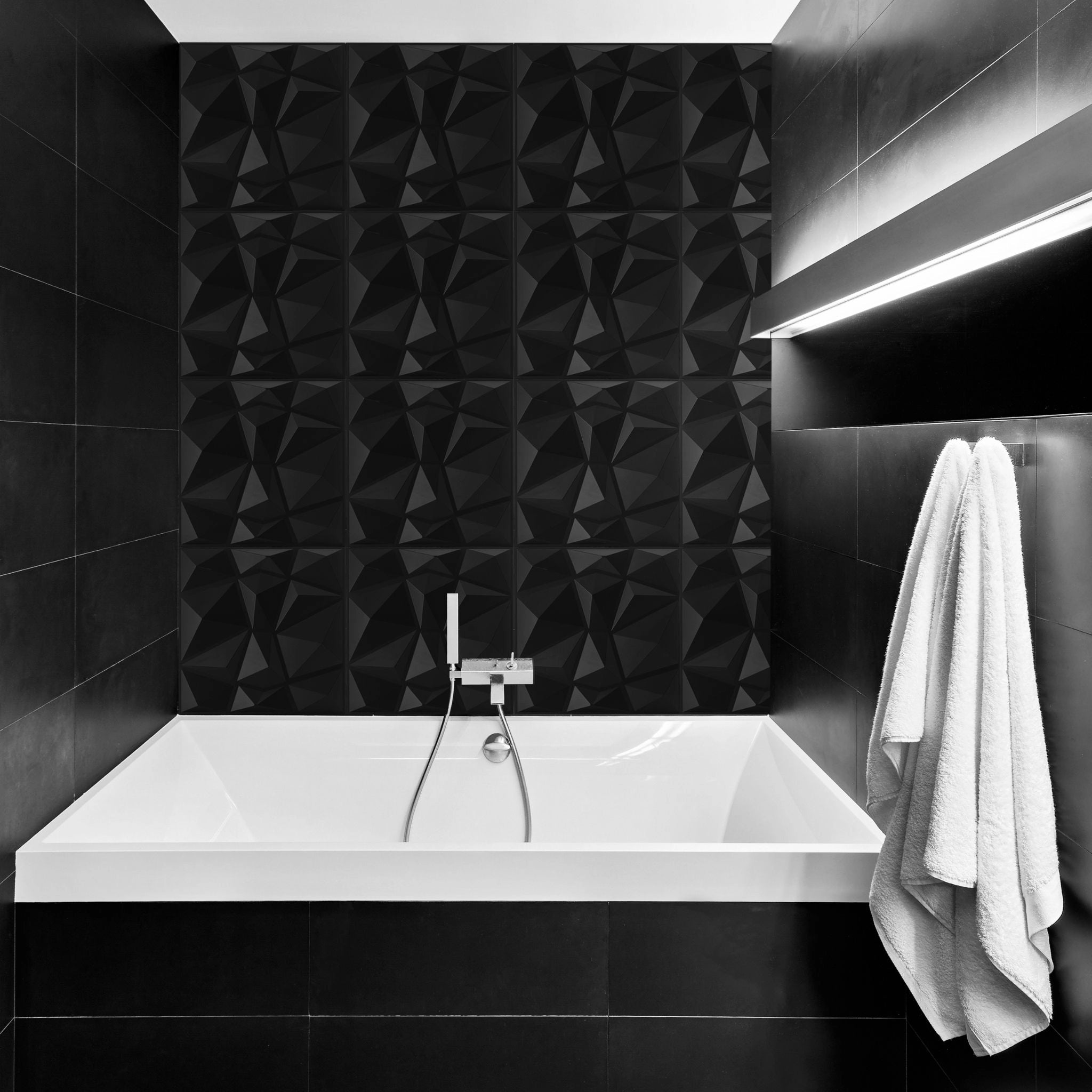 Black PVC wall panel with geometric design in modern bathroom