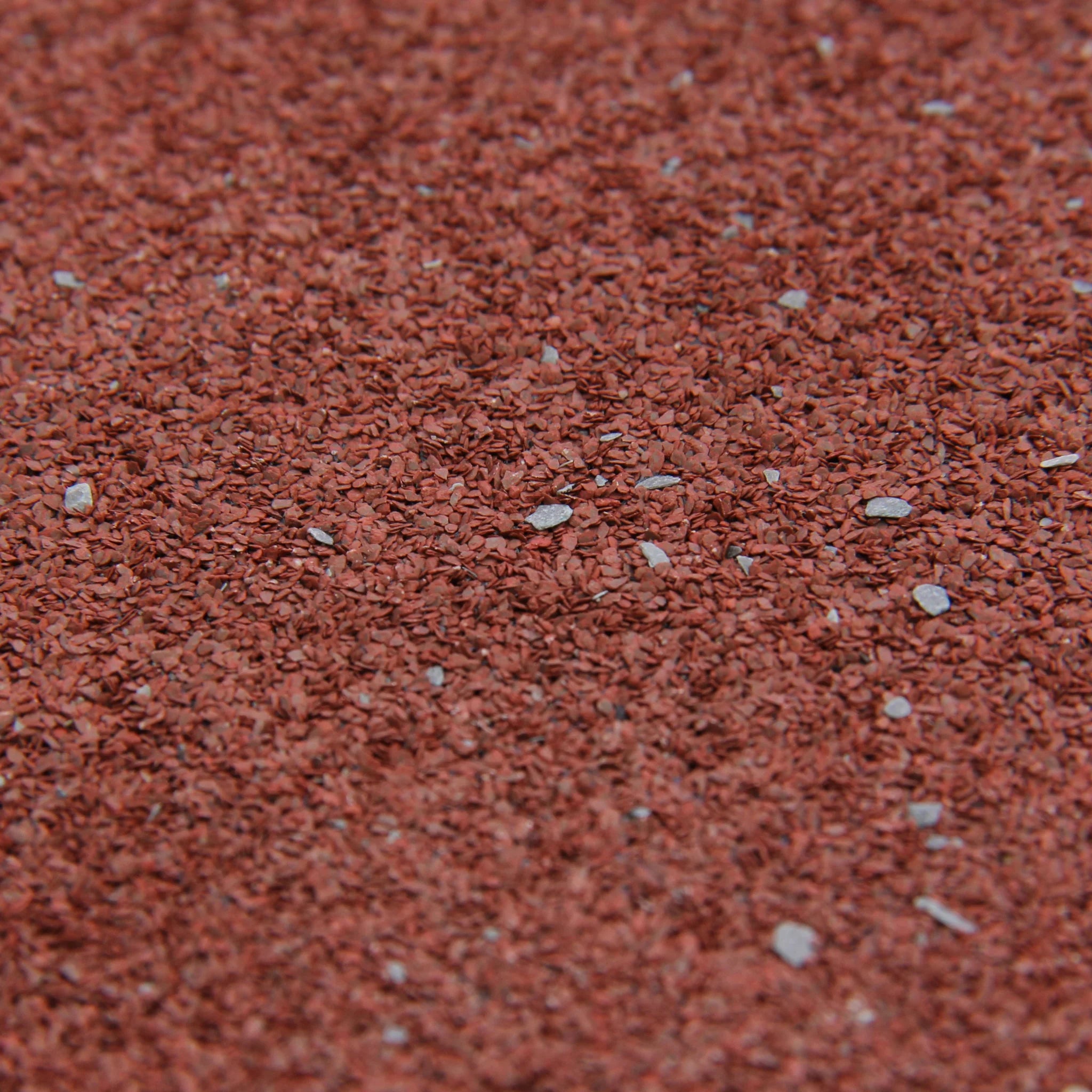 close-up of red roofing felt texture