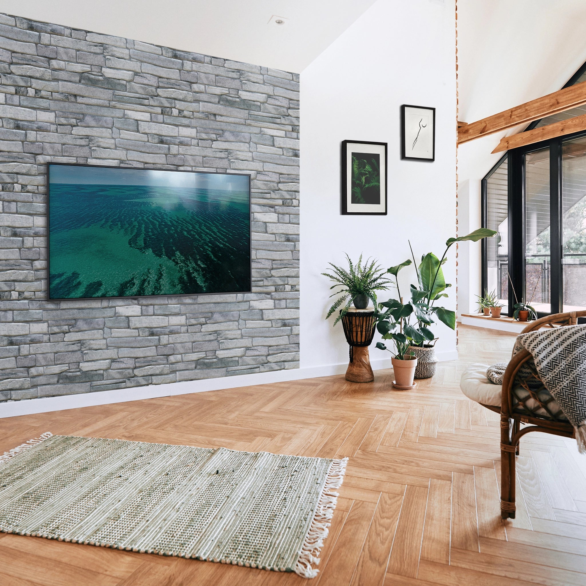 Modern living room with grey wall panel featuring geometric patterns