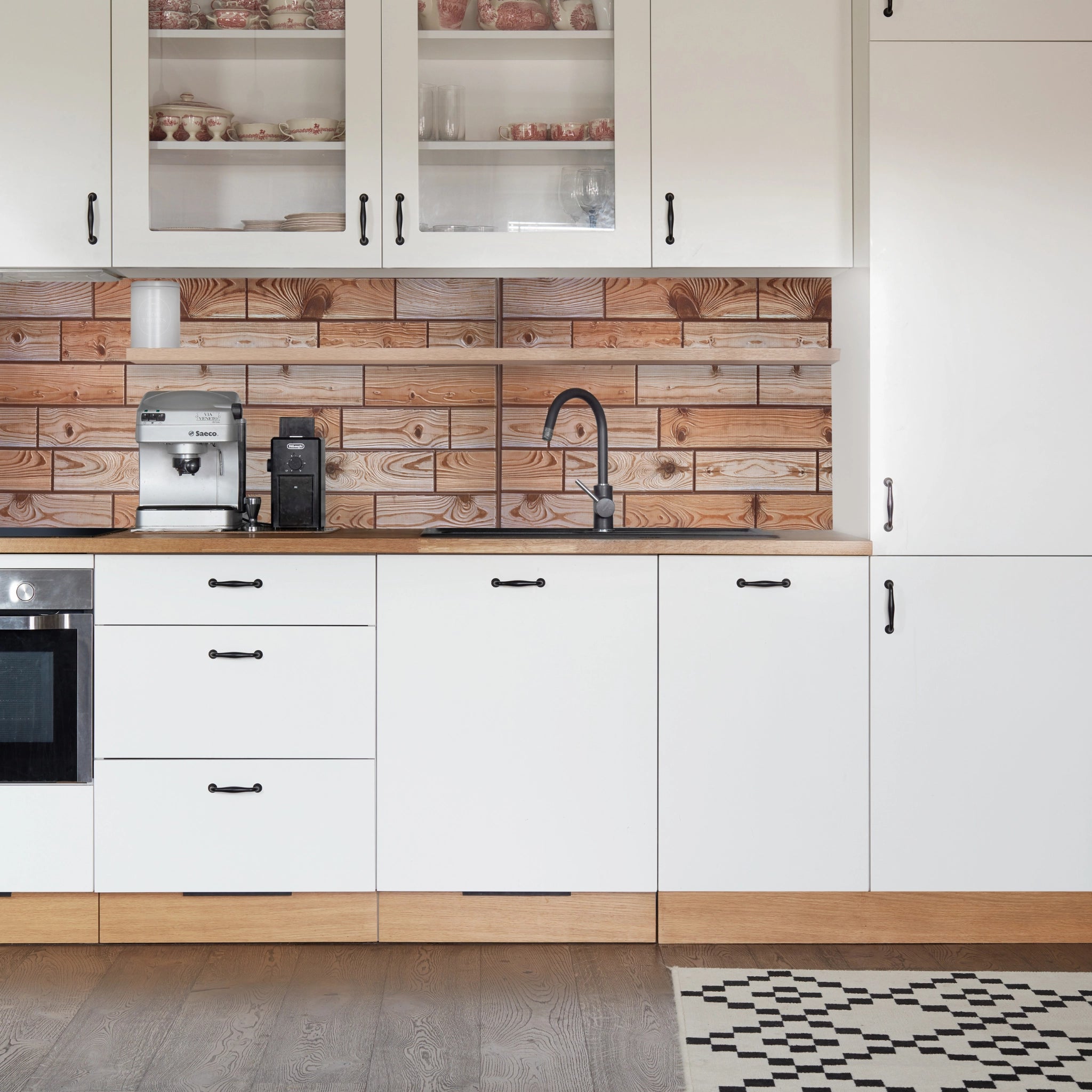 Kitchen with brown geometric-patterned wall panels and modern decor