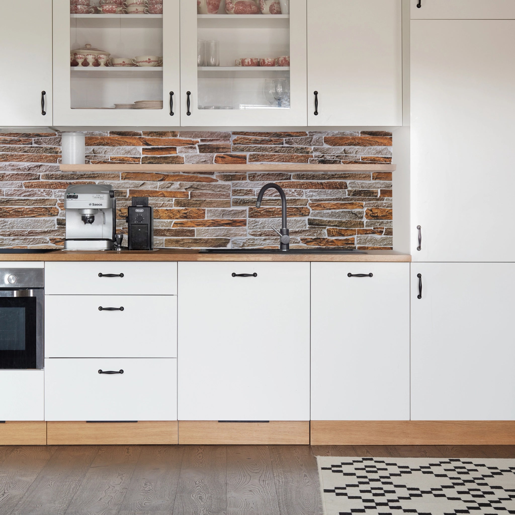 Kitchen with natural sandstone geometric-patterned wall panels and modern decor