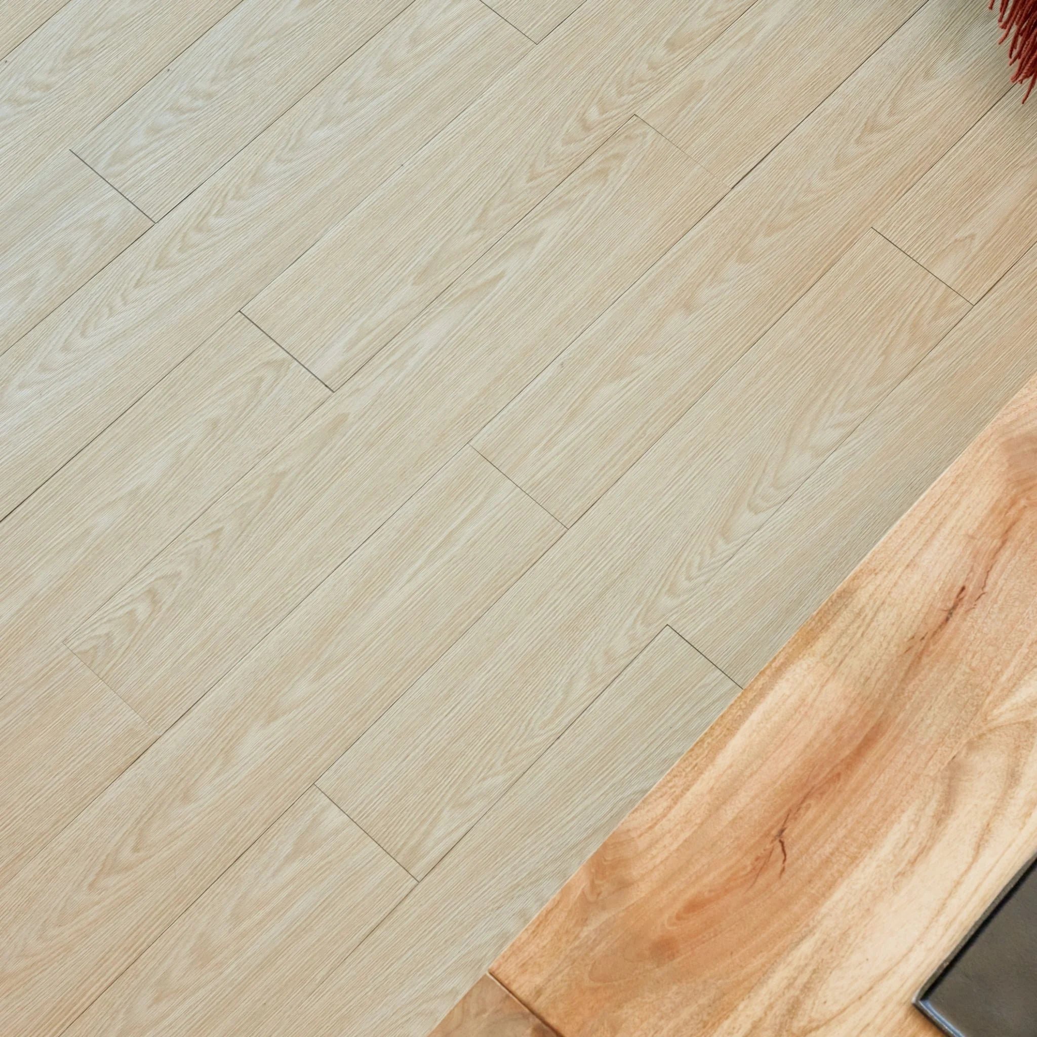 modern kitchen corner with brown cabinets and natural beige wood-effect flooring