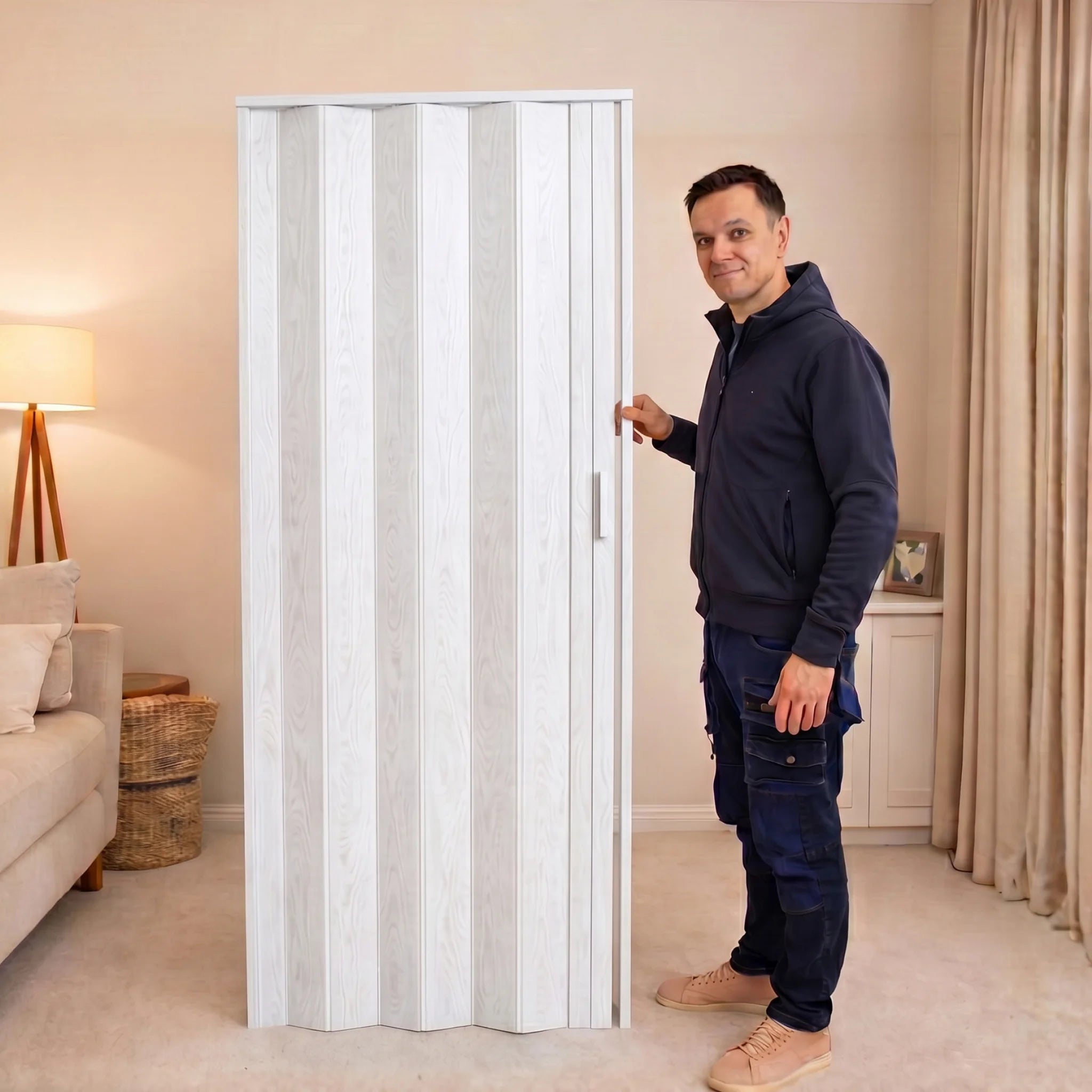 Man standing beside PVC folding door