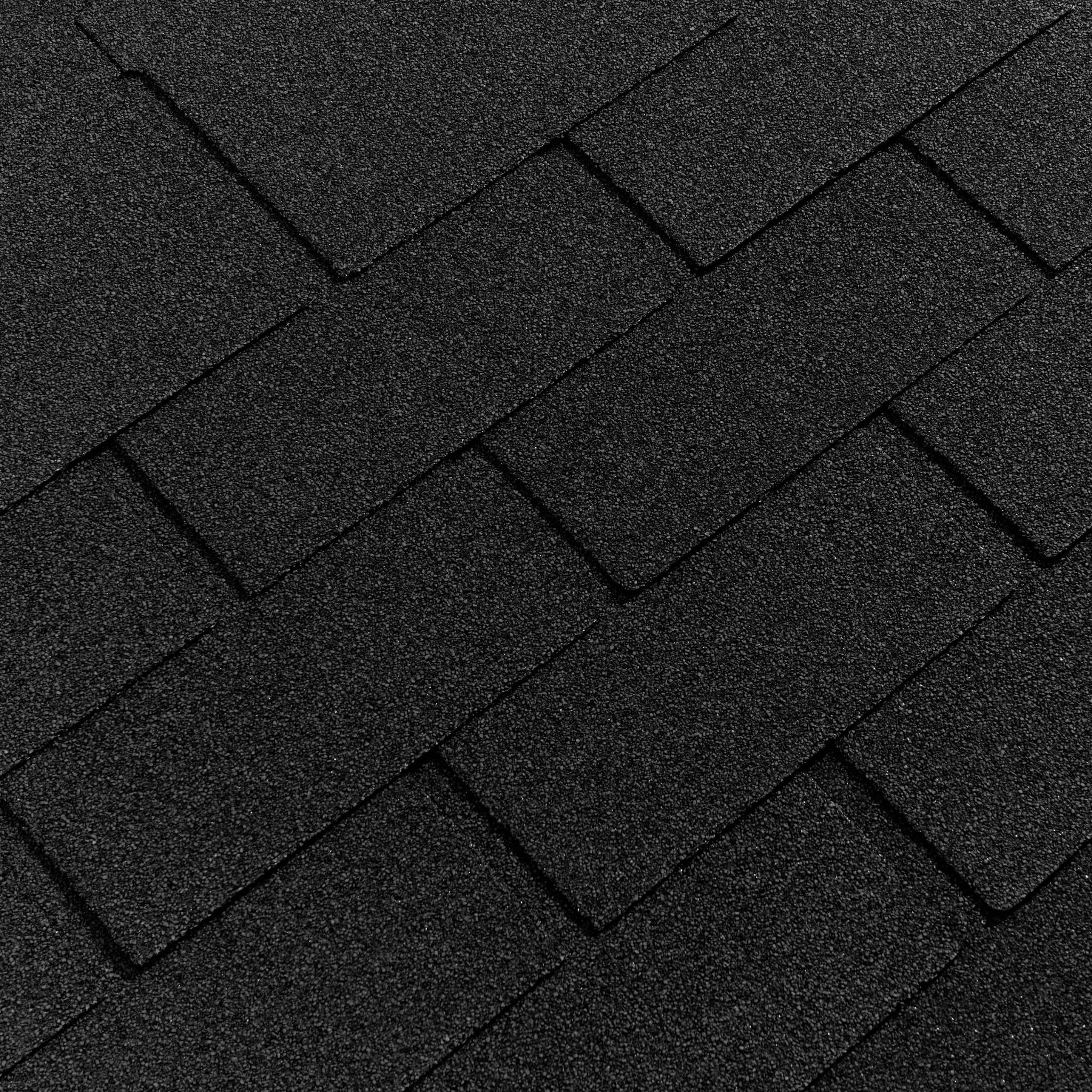 Close-up view of graphite asphalt roof shingles