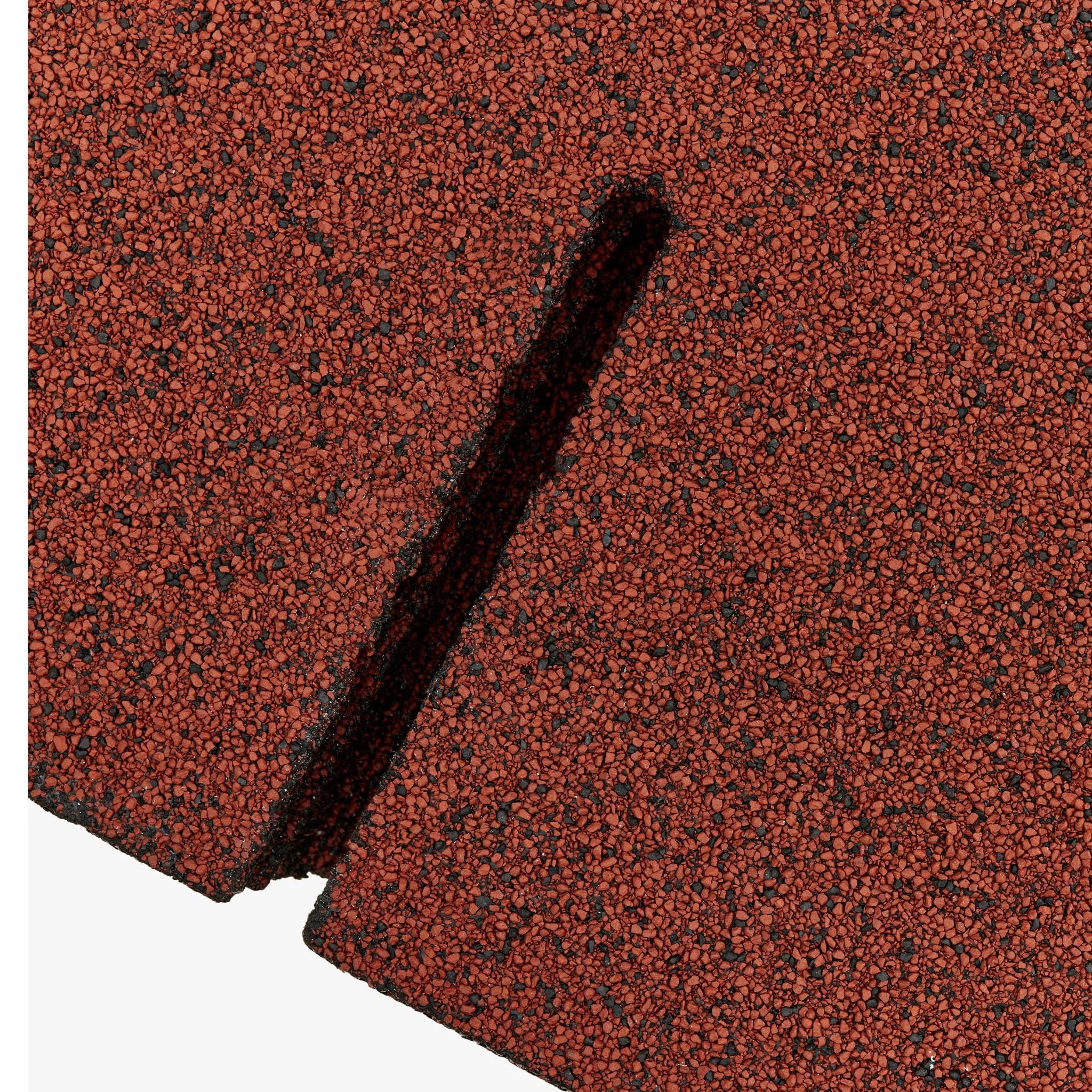 Close-up view of red asphalt roof shingles