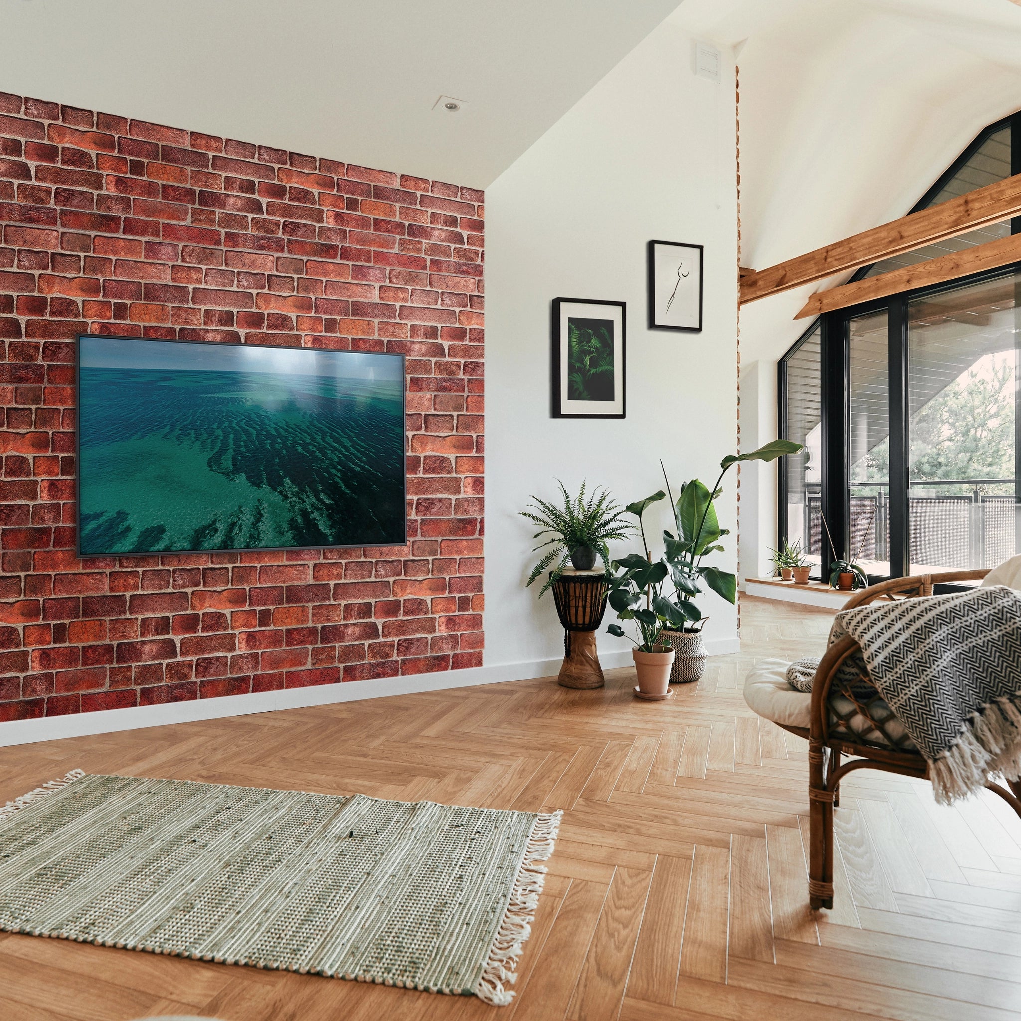 Modern living room with red wall panel featuring geometric patterns