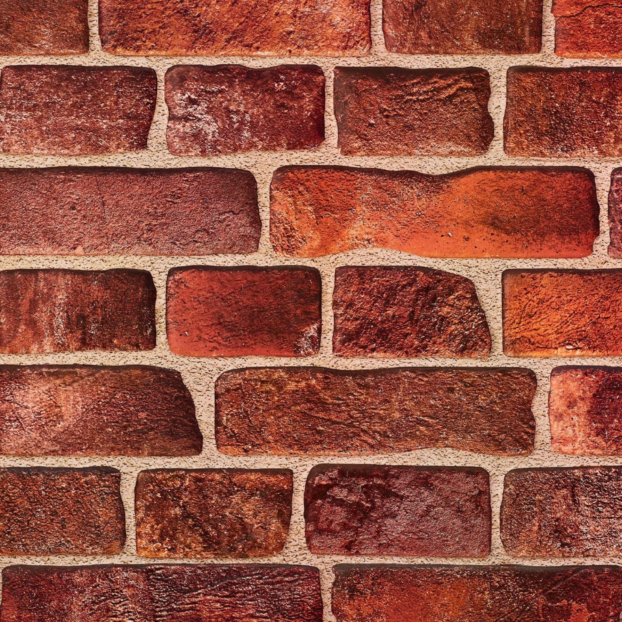 Red wall panel with geometric patterns, close-up view