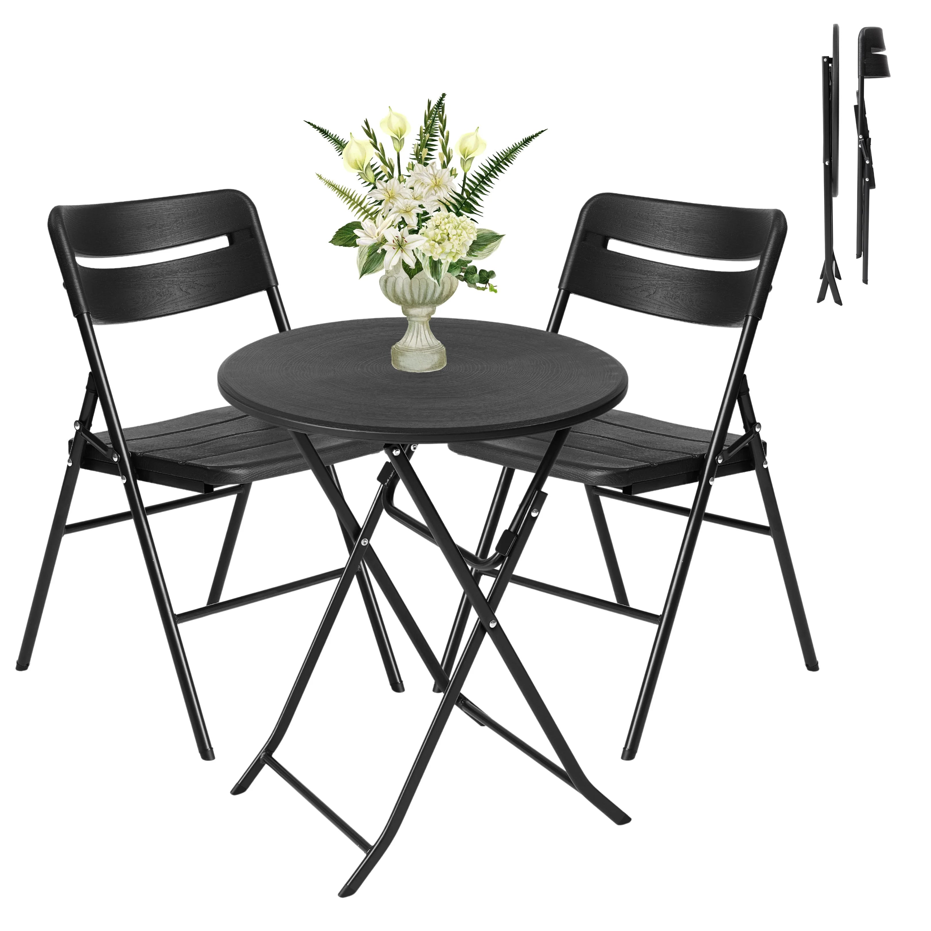 black round folding table and chair shown open and folded