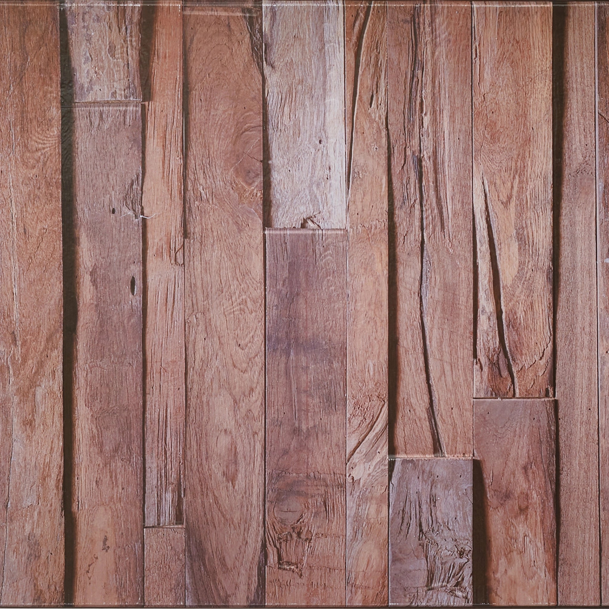 Close-up of brown wall panel with geometric designs