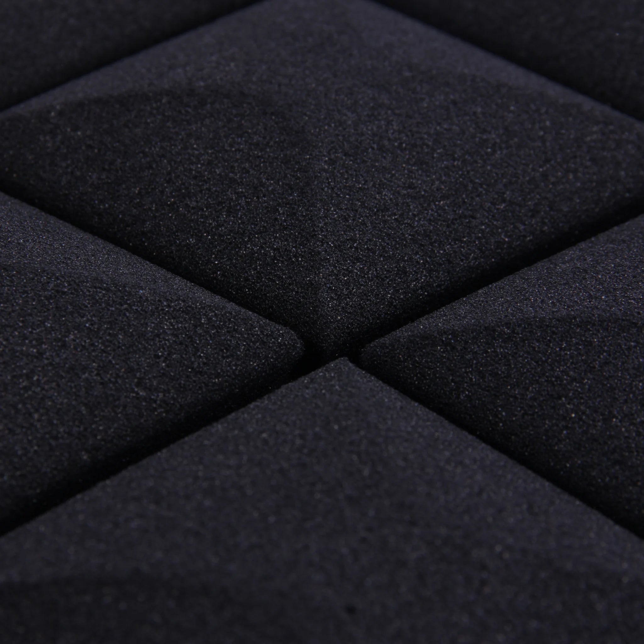 black pyramid dome shaped acoustic foam panel emphasizing its unique texture