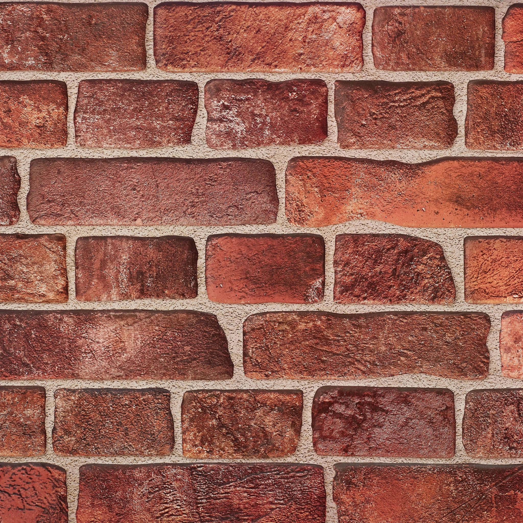 Close-up of red wall panel with geometric designs