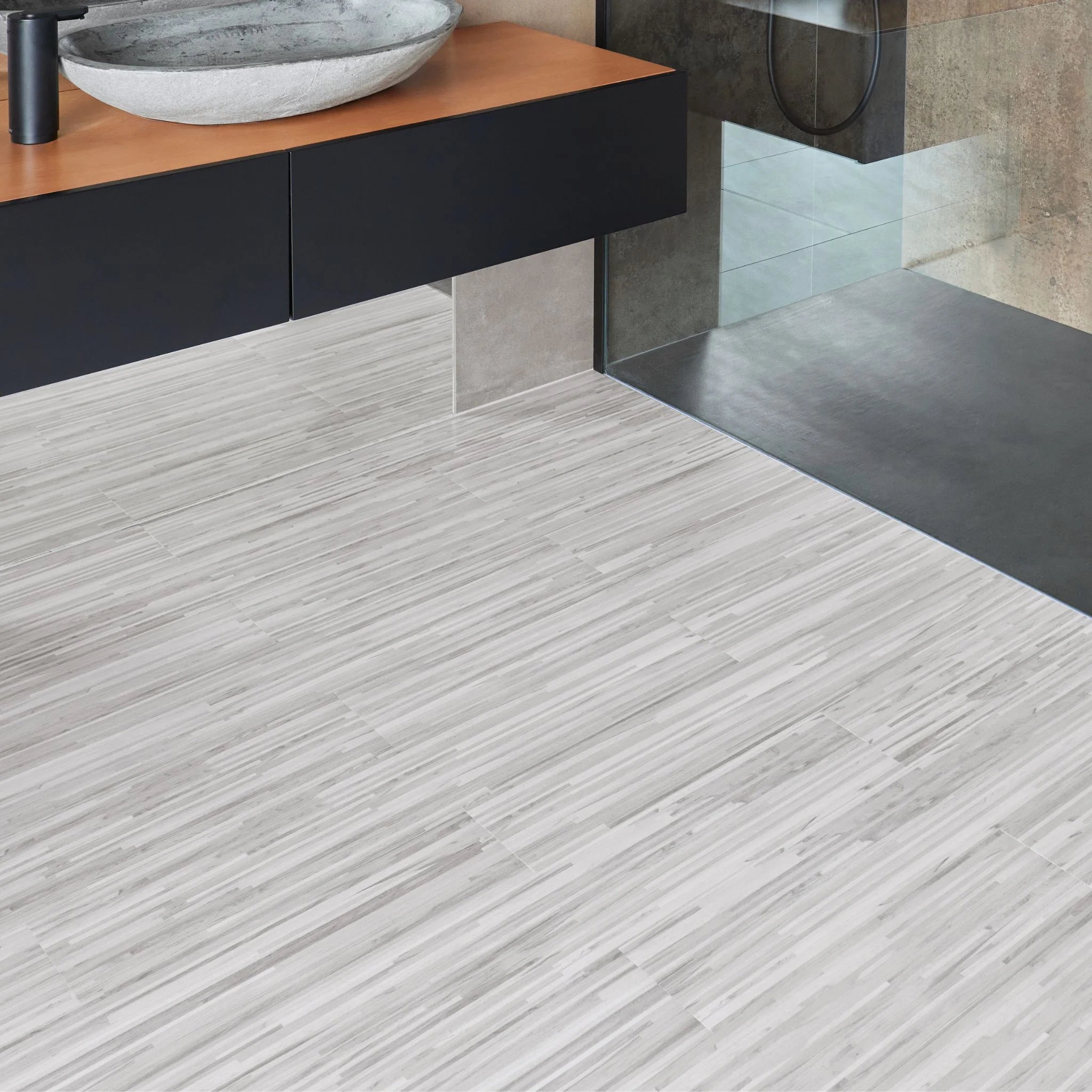 Striped grey vinyl wooden flooring in a modern bathroom setting