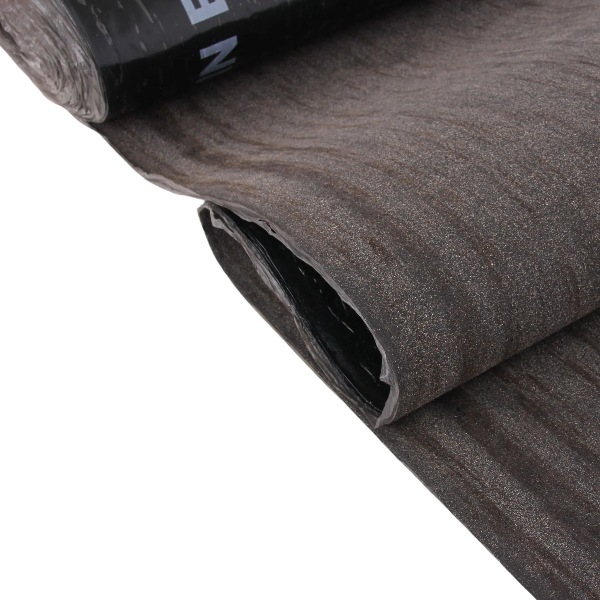close-up of rolled underlay with black and brown textured material