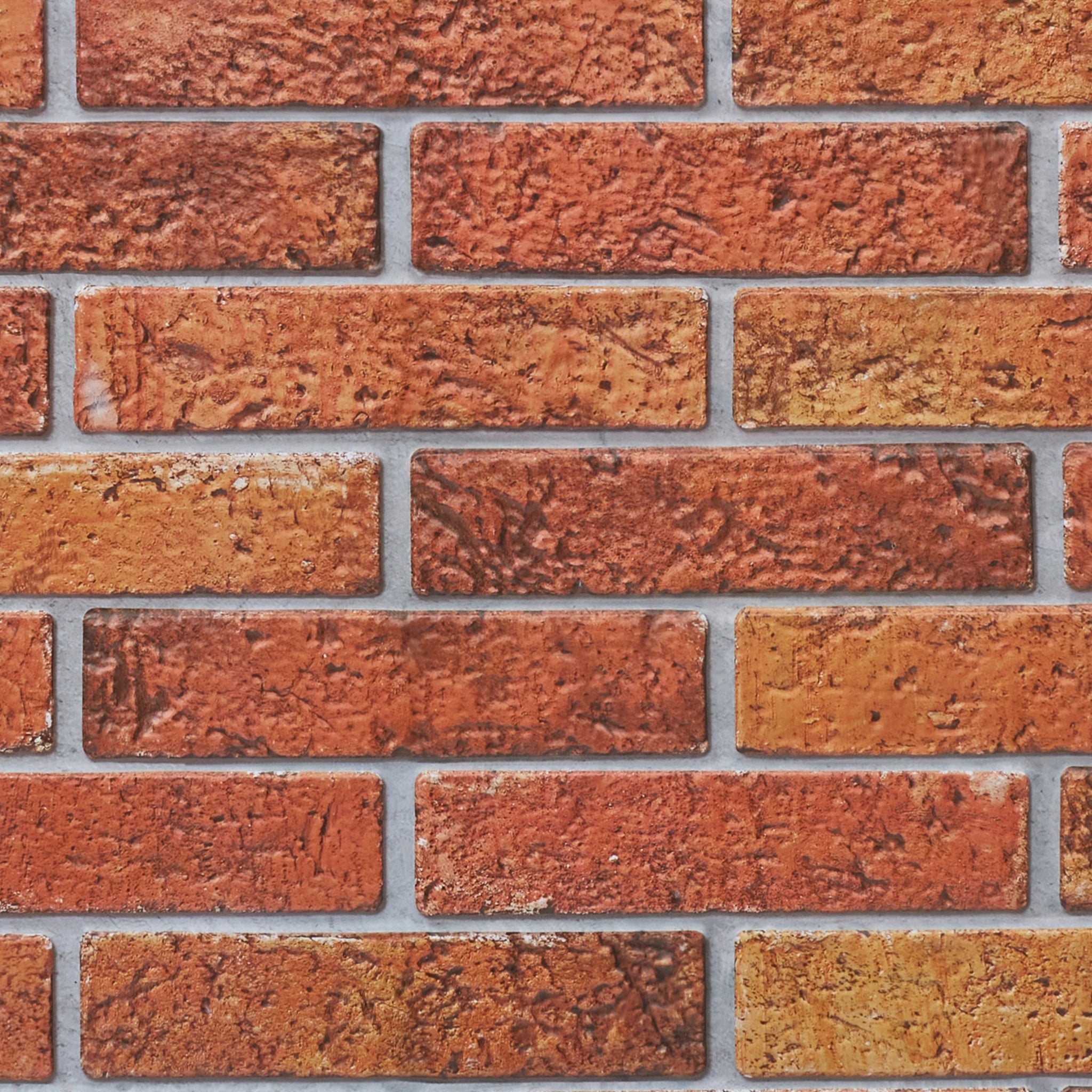 Close-up of red wall panel with geometric designs