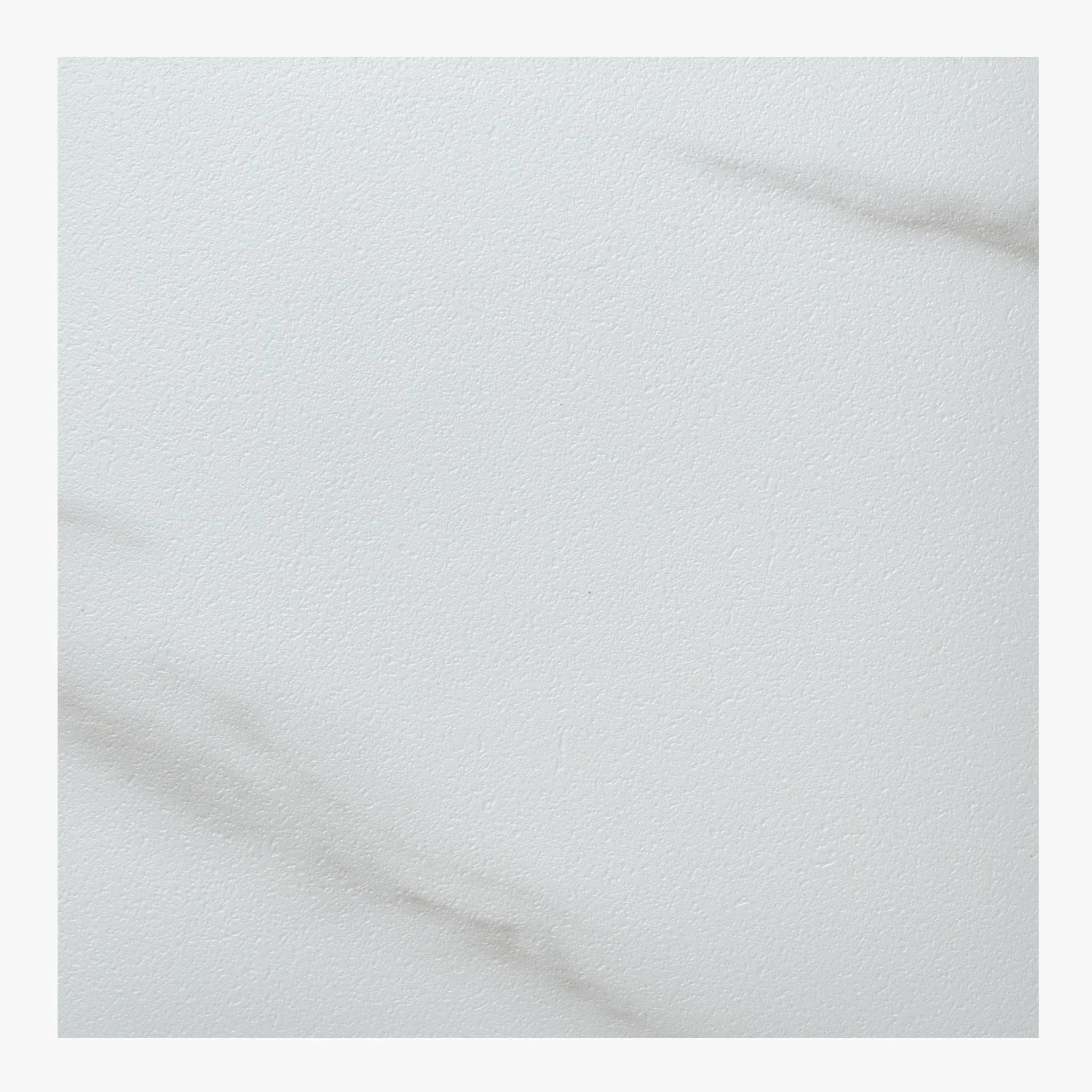 detailed view of white tile-effect concrete flooring with subtle grain patterns