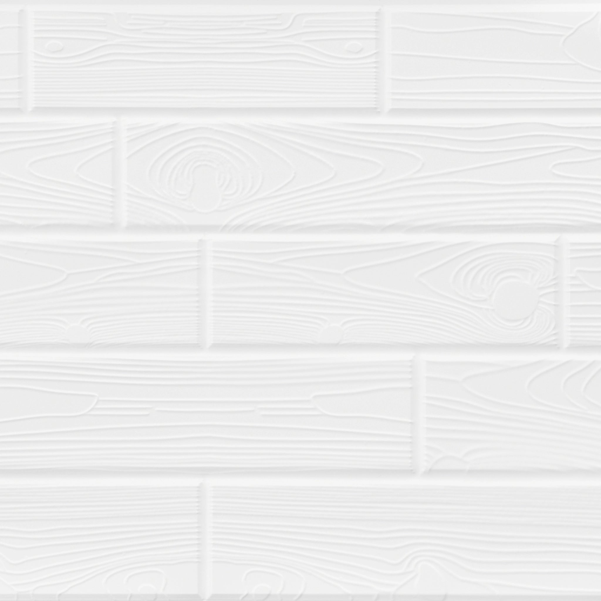 Close-up of white wall panel with geometric designs