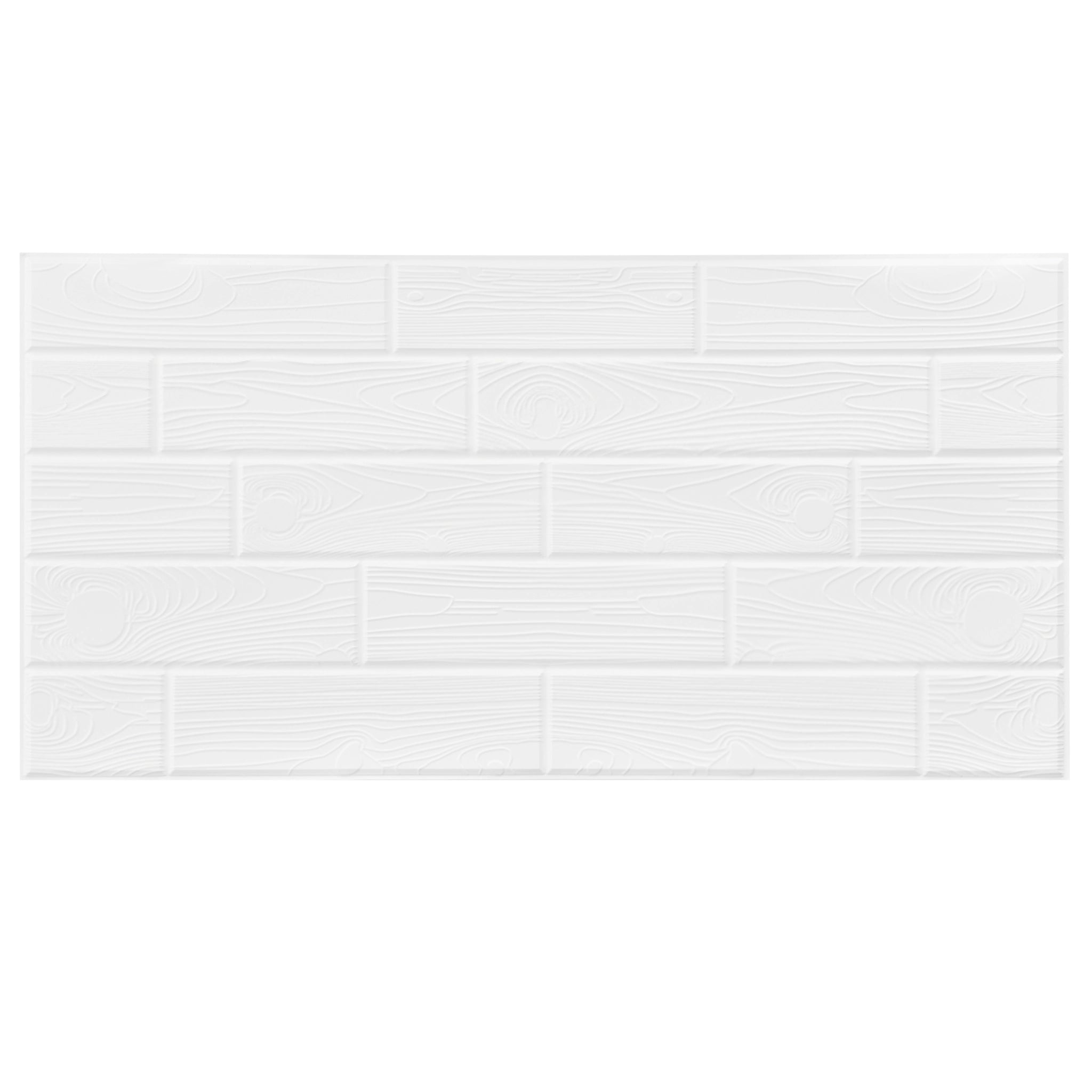 White wall panel with geometric patterns, close-up view