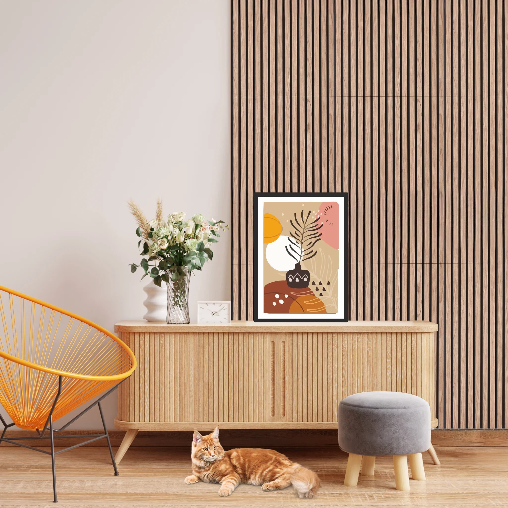 Acoustic wall panels in the background with a cat resting beside a wooden cabinet