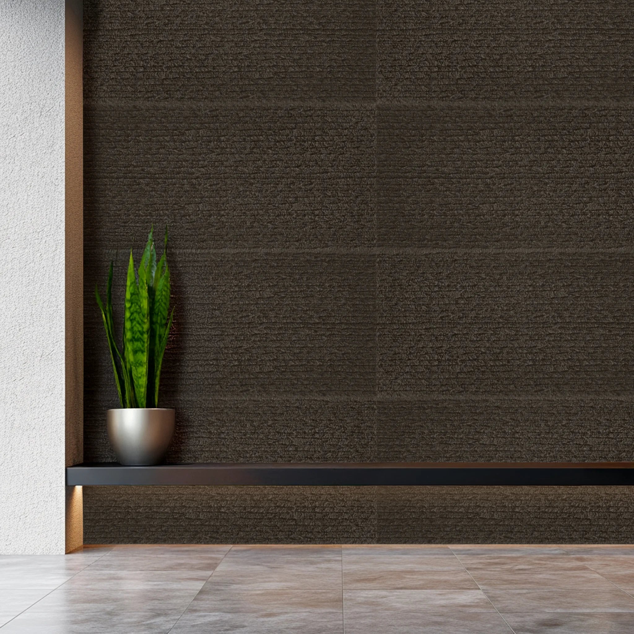 Faux stone wall panels charcoal brown with 3D texture behind shelf and plant in modern interior