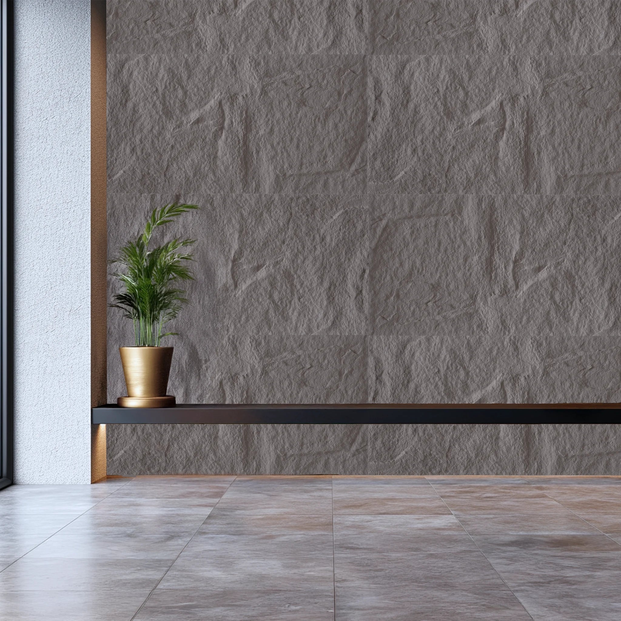 Faux stone wall panels volcanic taupe grey with 3D texture behind shelf and plant in modern interior