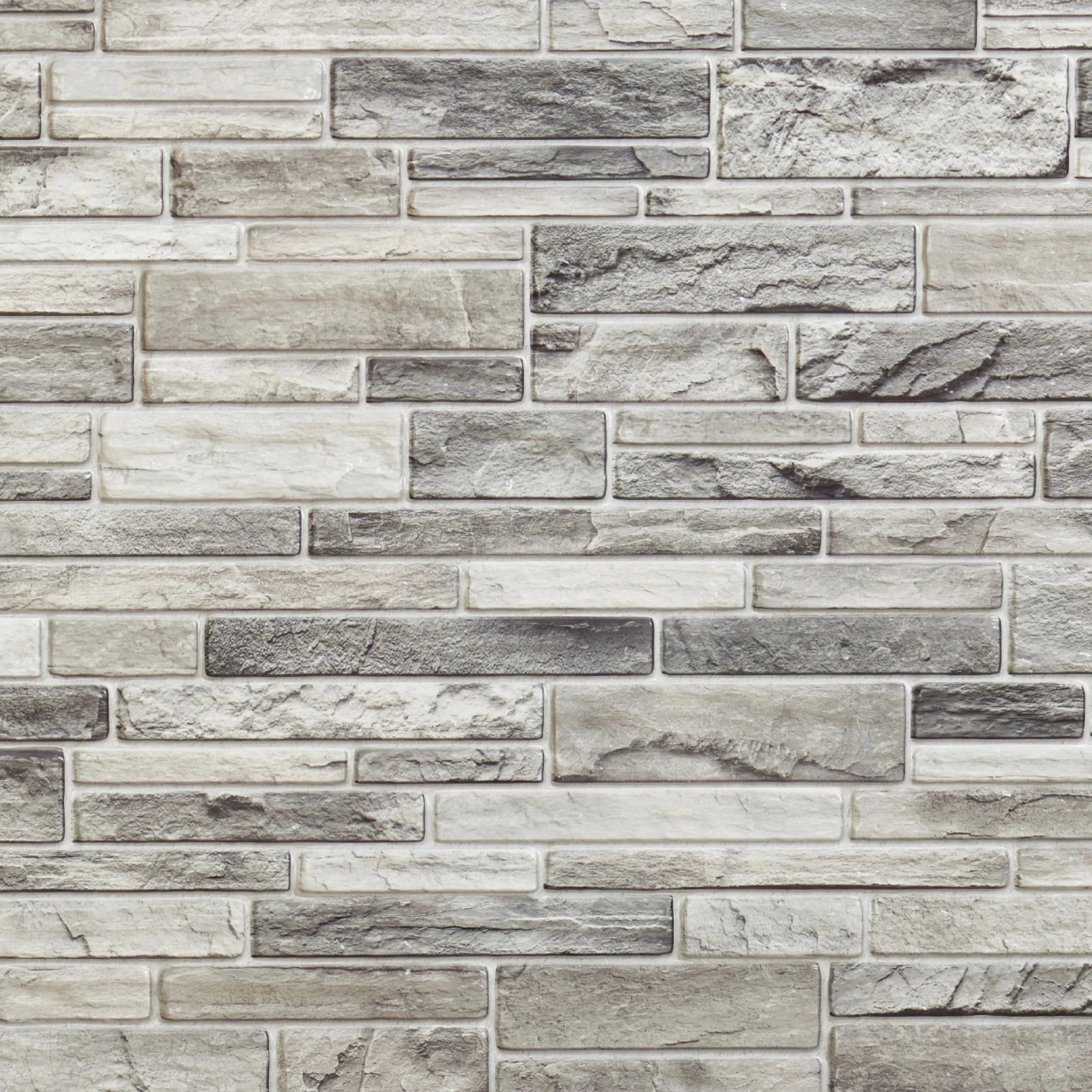 close-up of light grey slim stone brick 3d wall panel texture