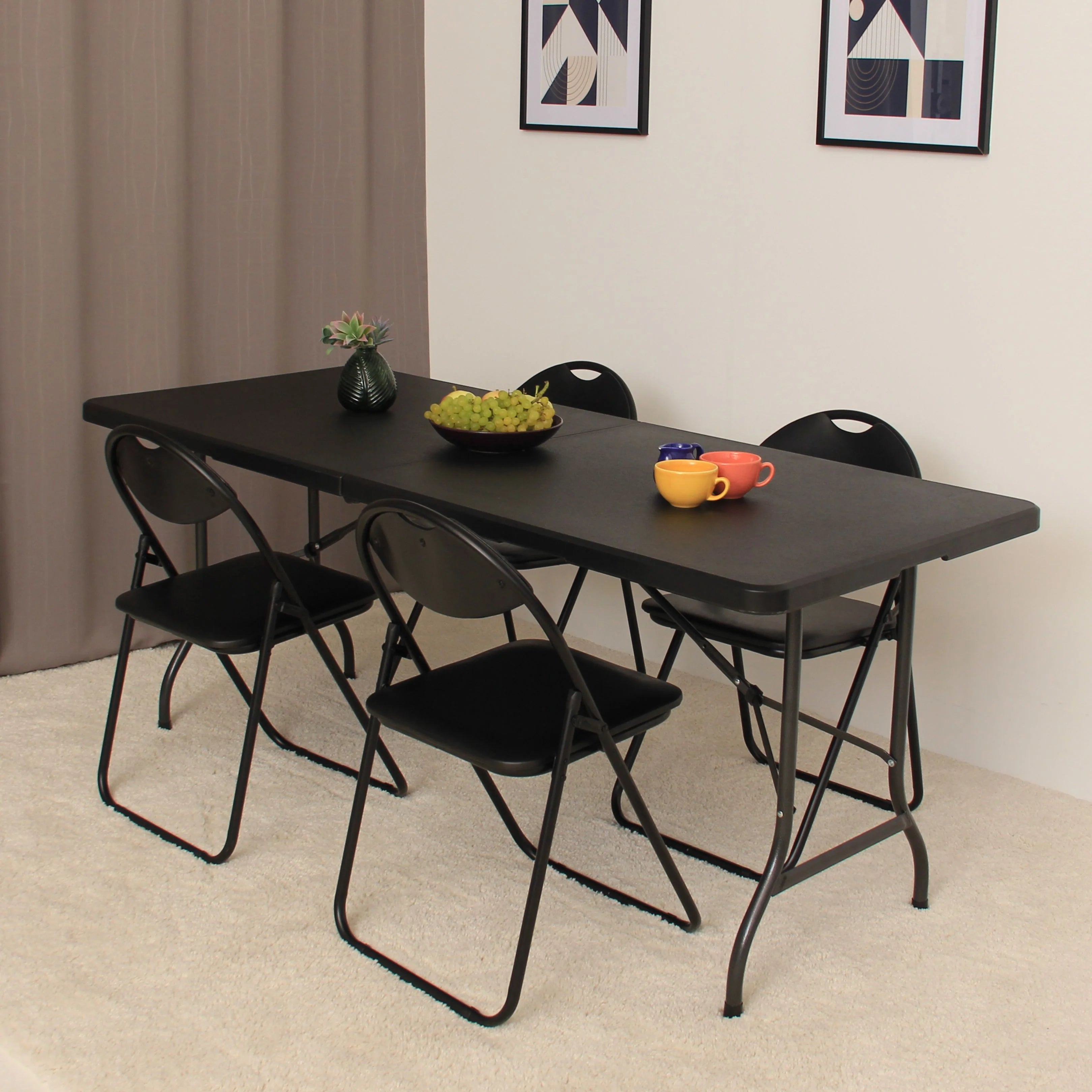 black 6ft folding table and chairs set up in modern space