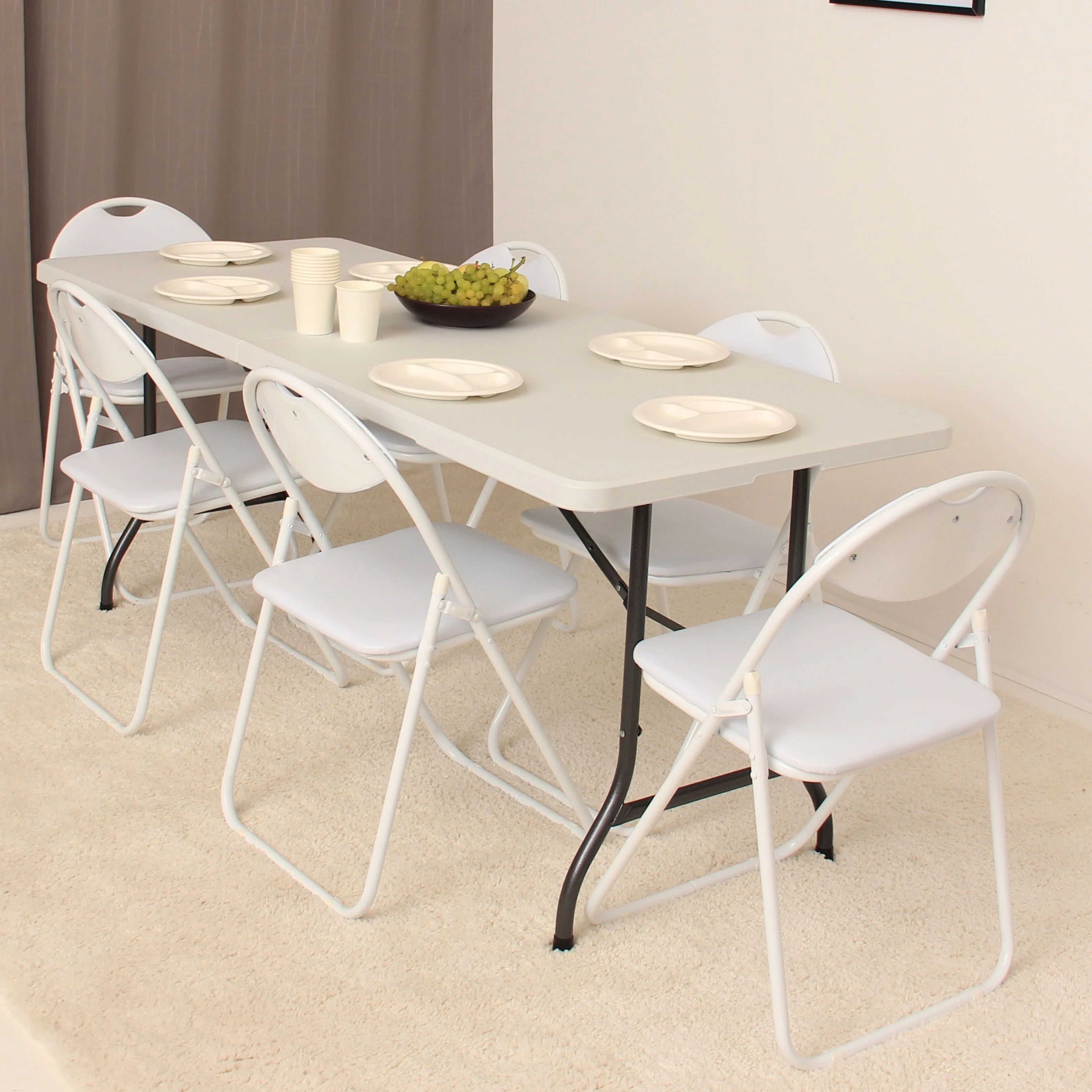 white 6ft folding table and chairs set up in modern open space