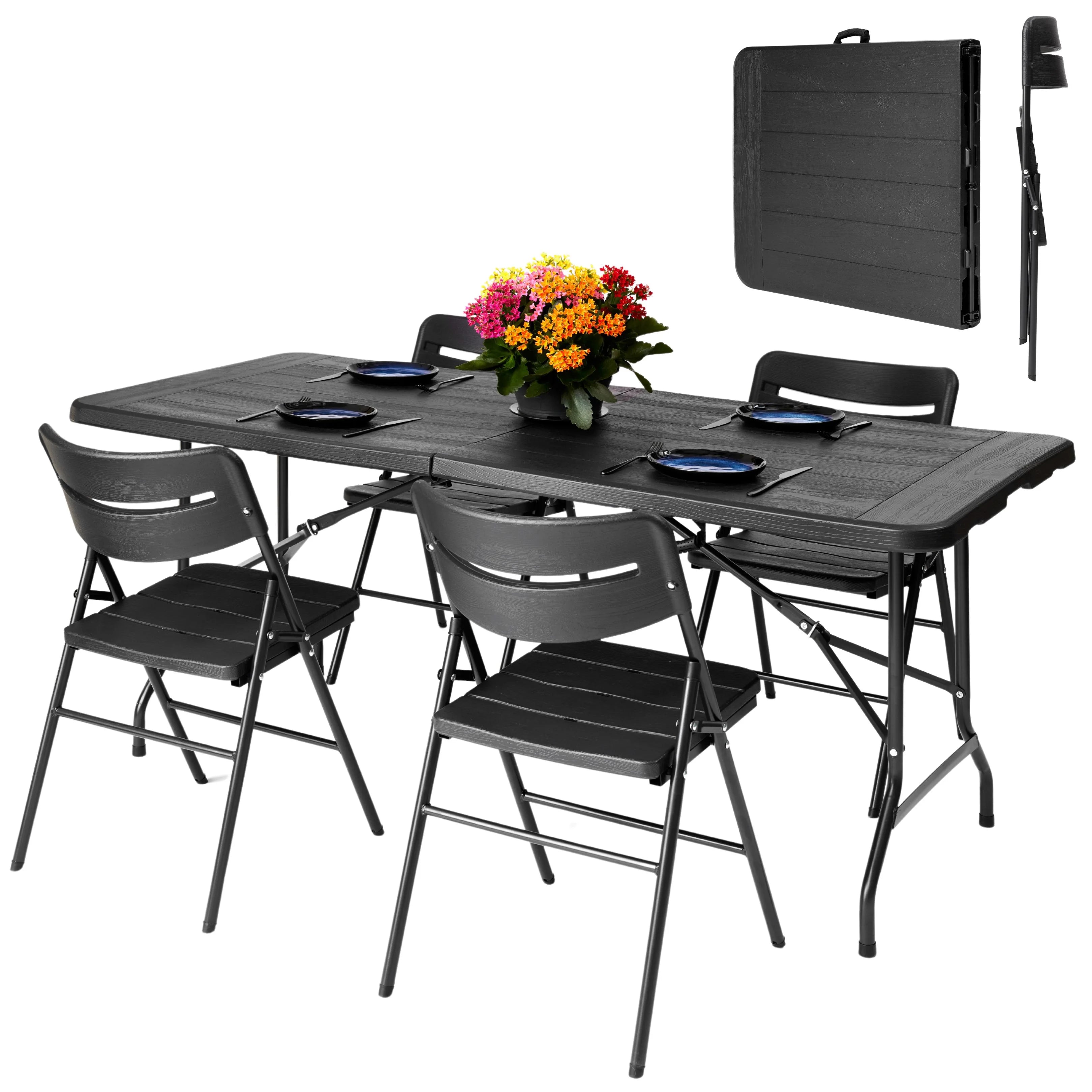 black 6ft folding table and chairs set up with plates folded view