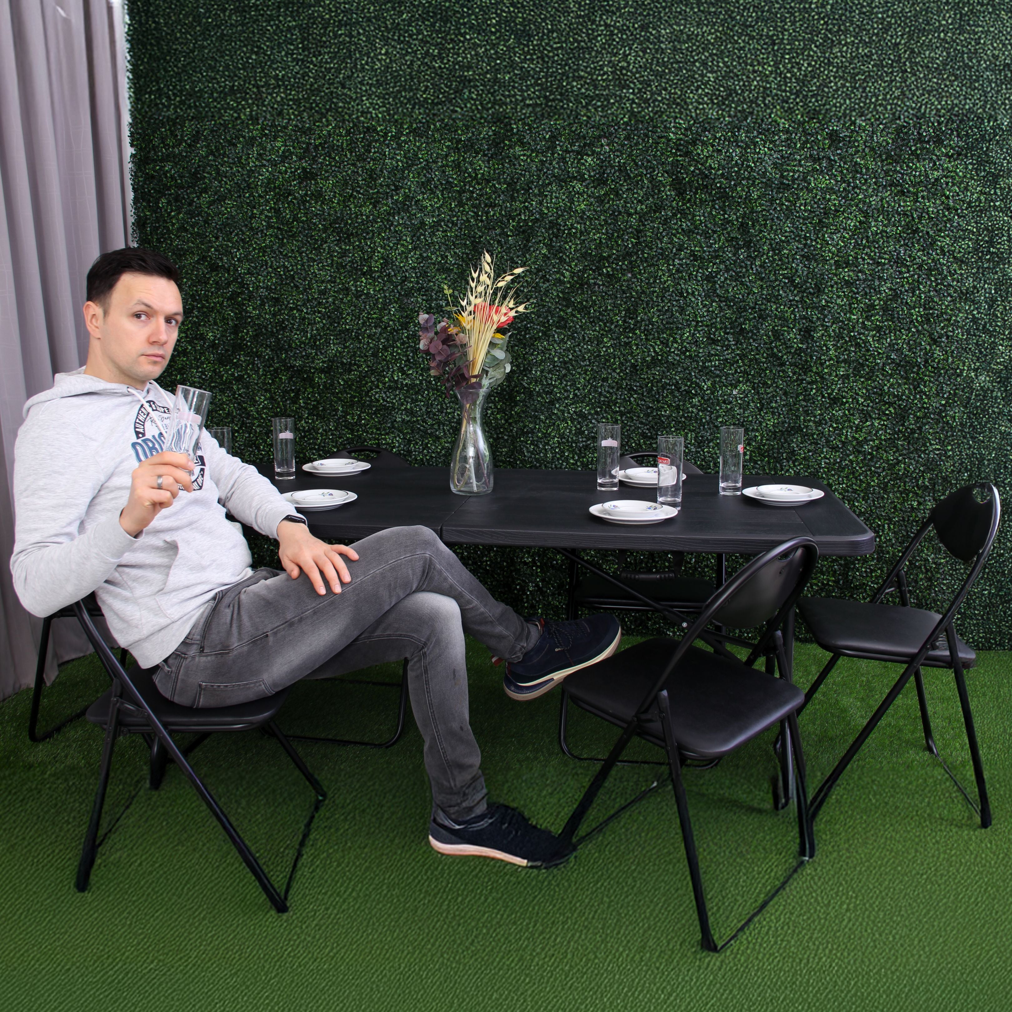 black 6ft folding table and chairs with food
