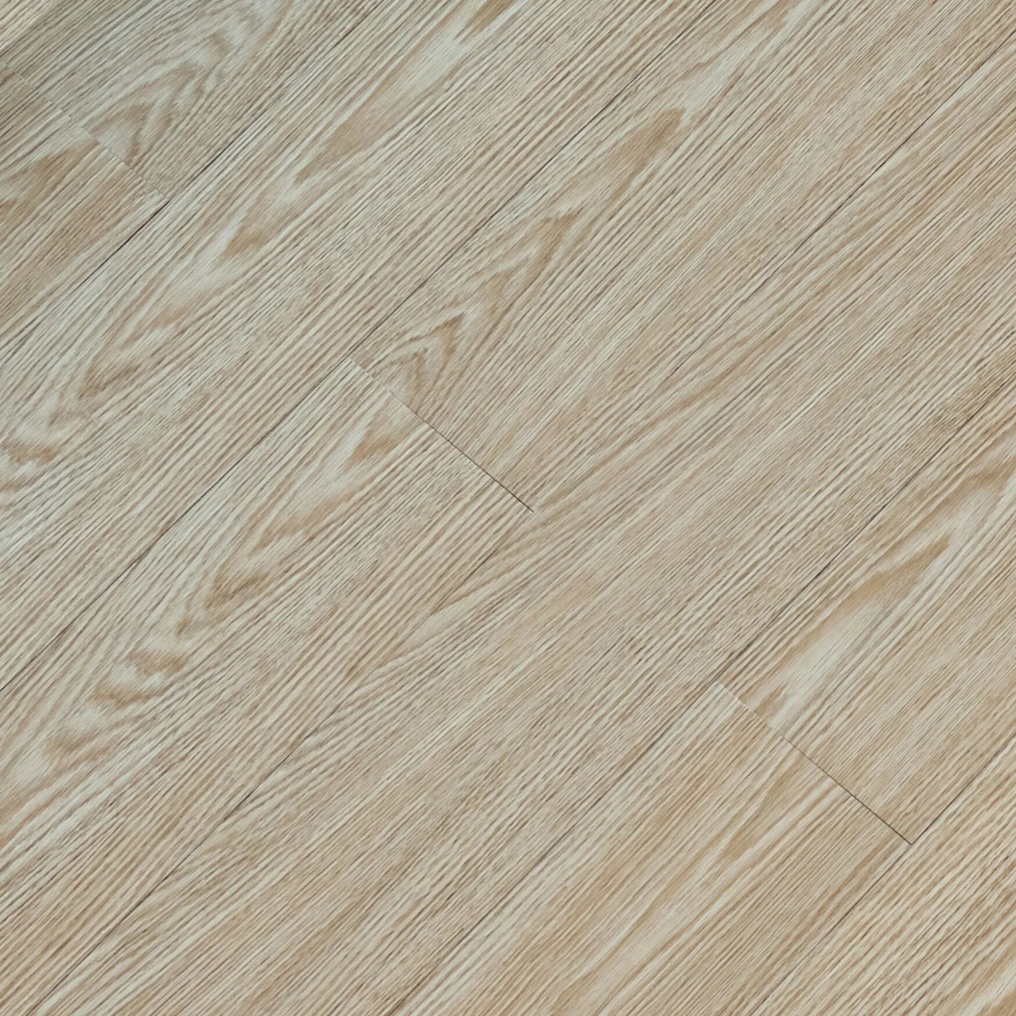 close-up of a wood-effect vinyl plank in light beige with grey undertones
