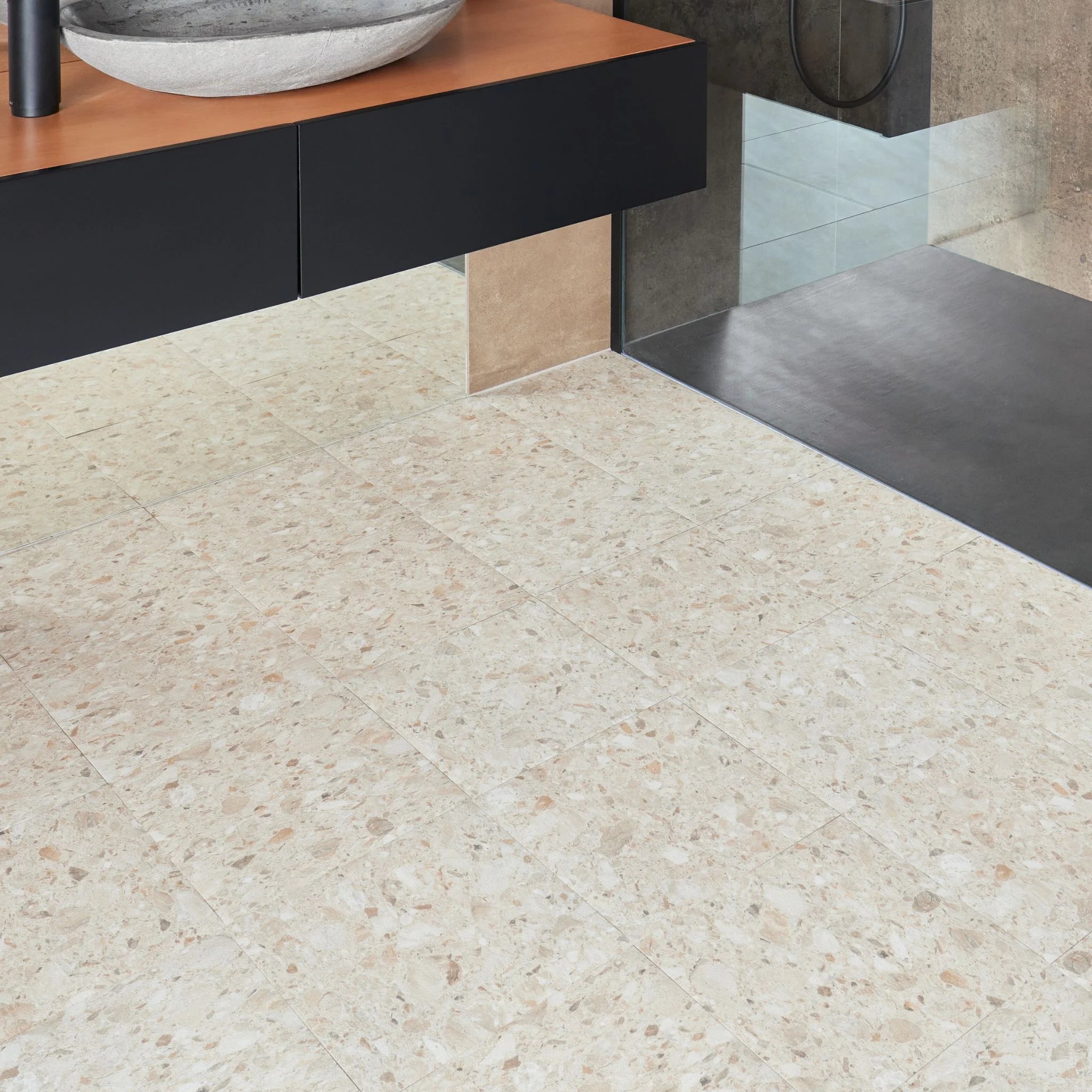 Terrazzo beige vinyl tile flooring in a modern bathroom setting