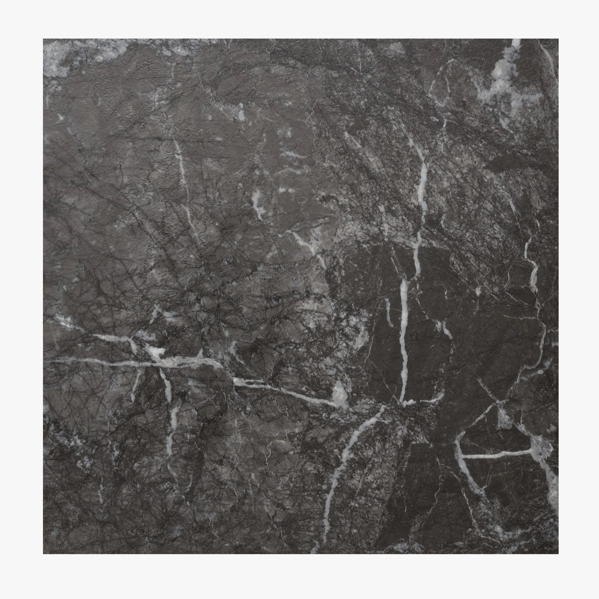 detailed view of black tile-effect concrete flooring with subtle grain patterns
