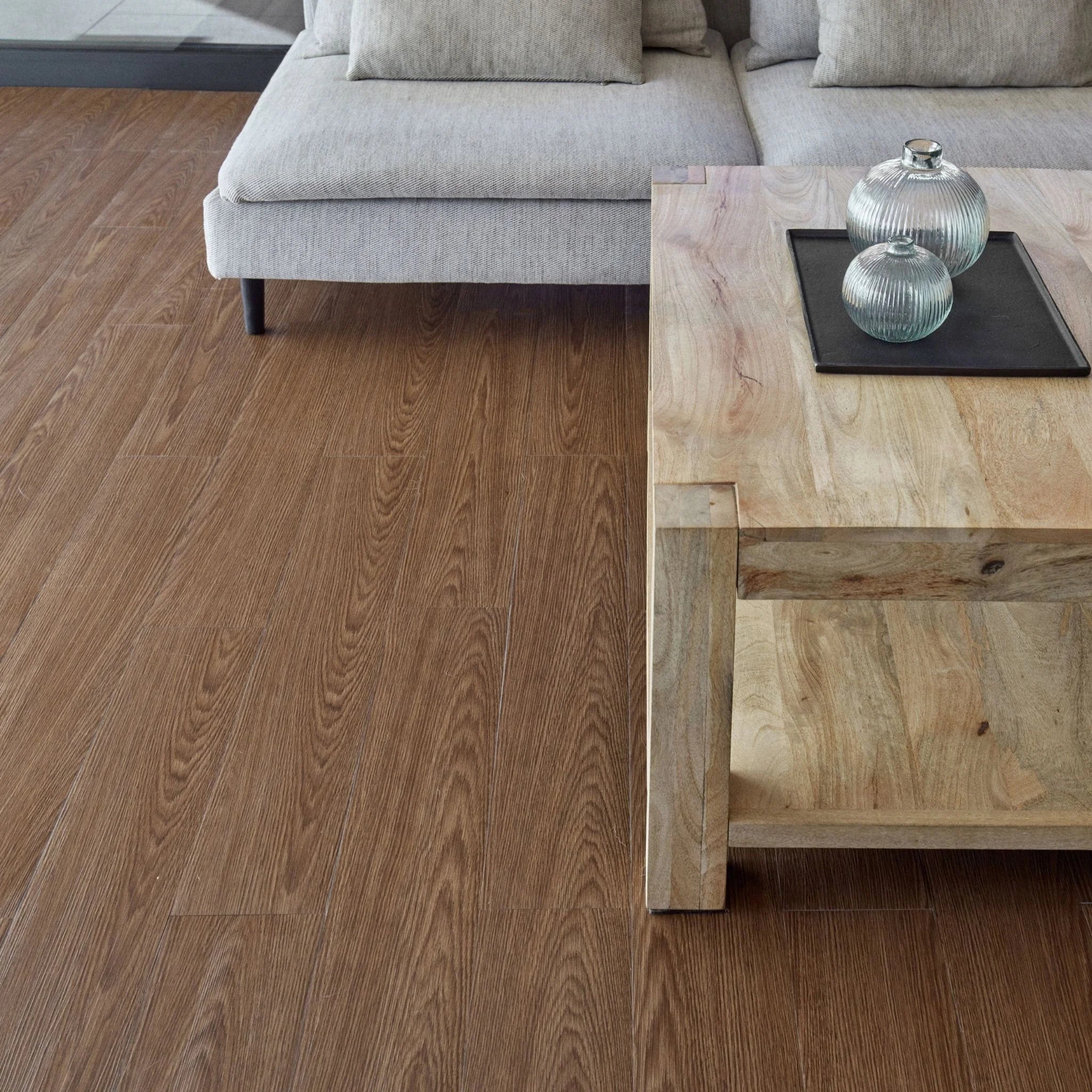 spacious living room with rustic furniture and brown wood-effect vinyl flooringwn